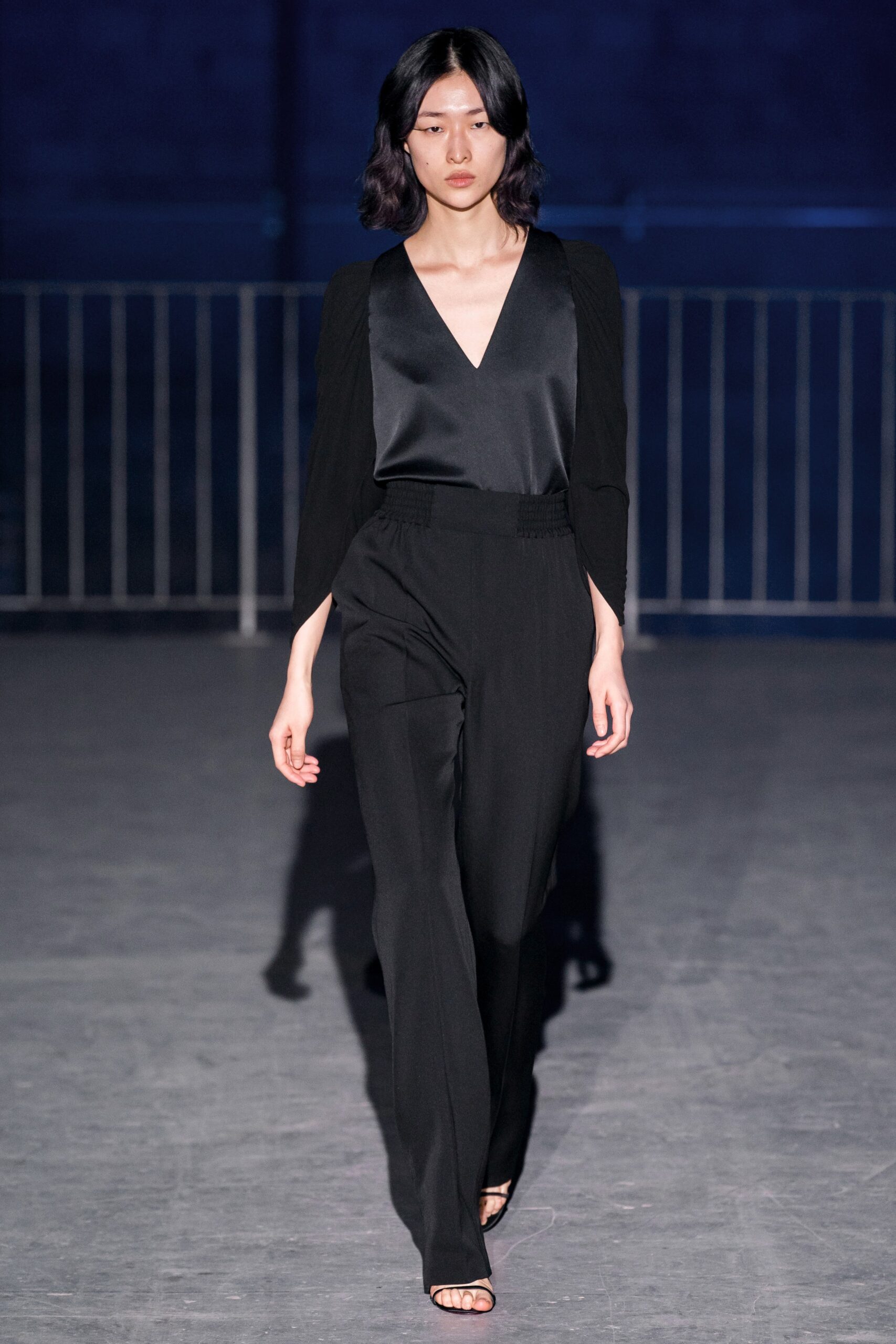 black silk top and tailored pants