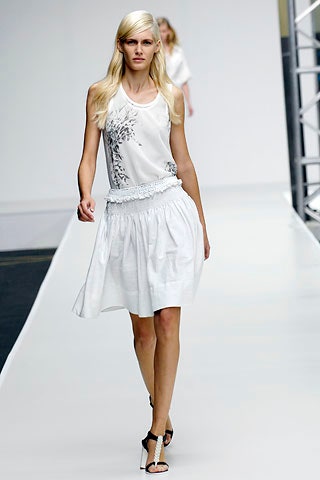 white relaxed top with pleated skirt