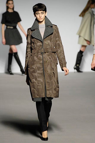 brown trench coat with black pants