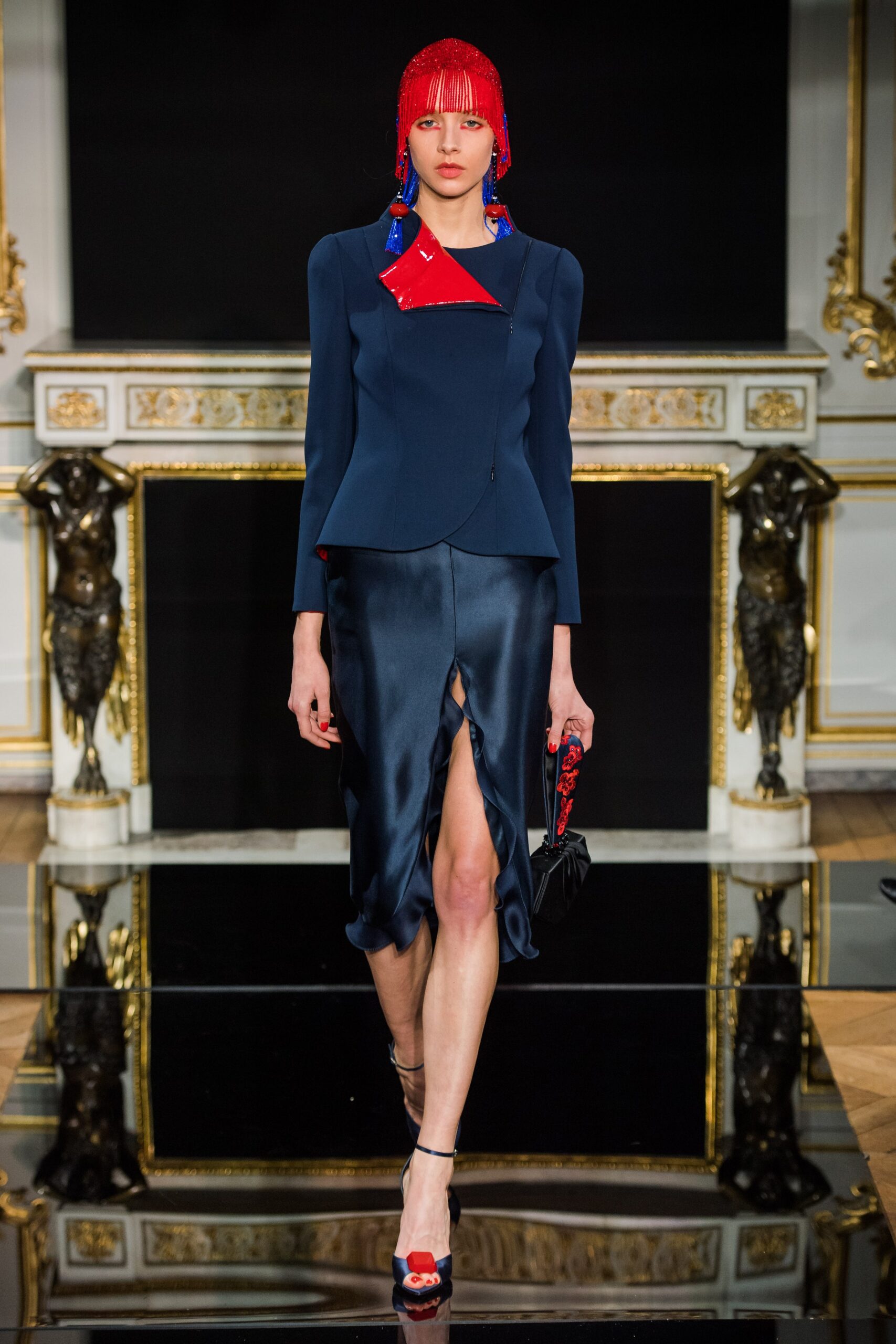 blue tailored blazer and black skirt