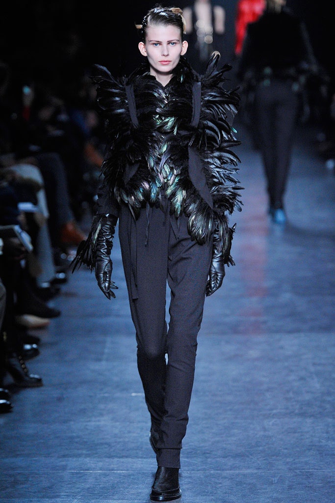 black feathered jacket with relaxed pants