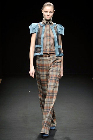 blue checked top with brown pants