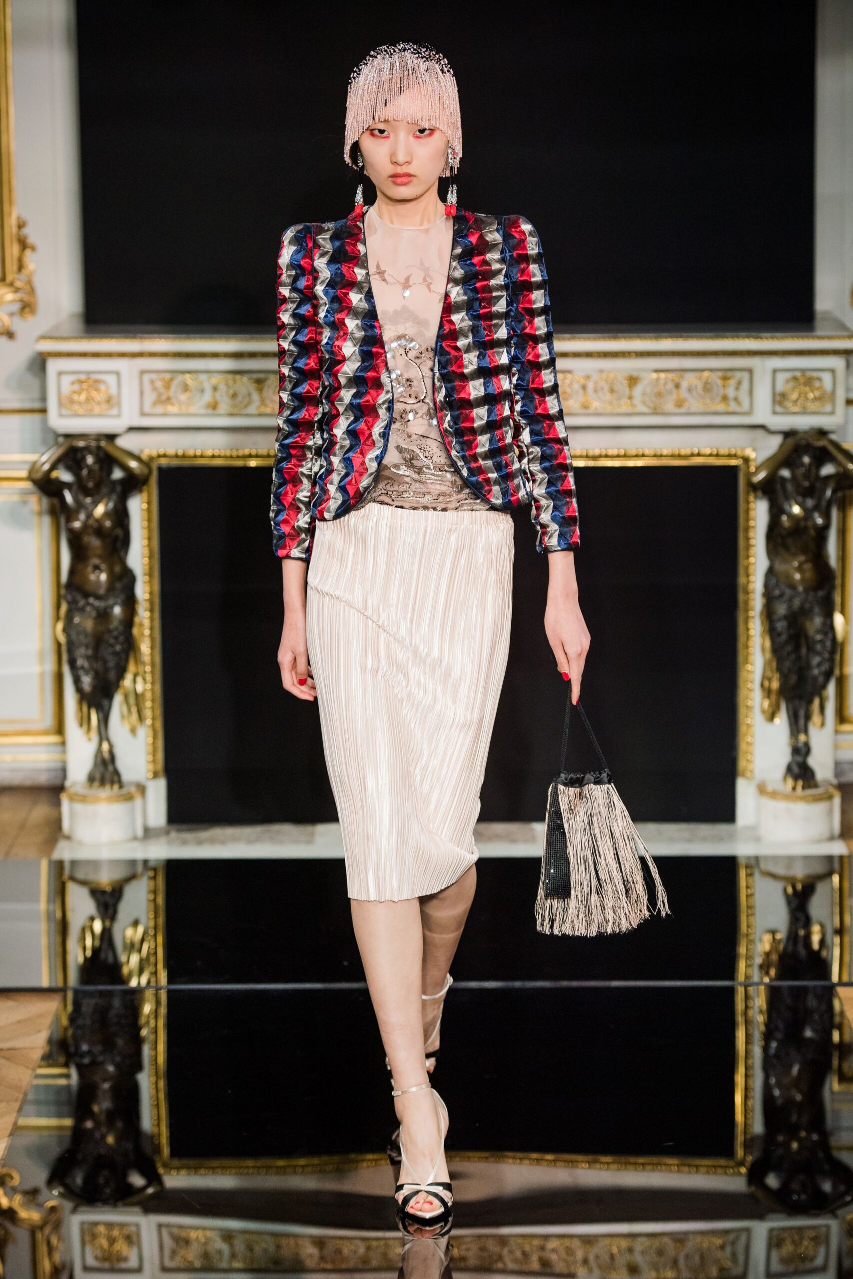 tailored color-blocked blazer with pleated skirt