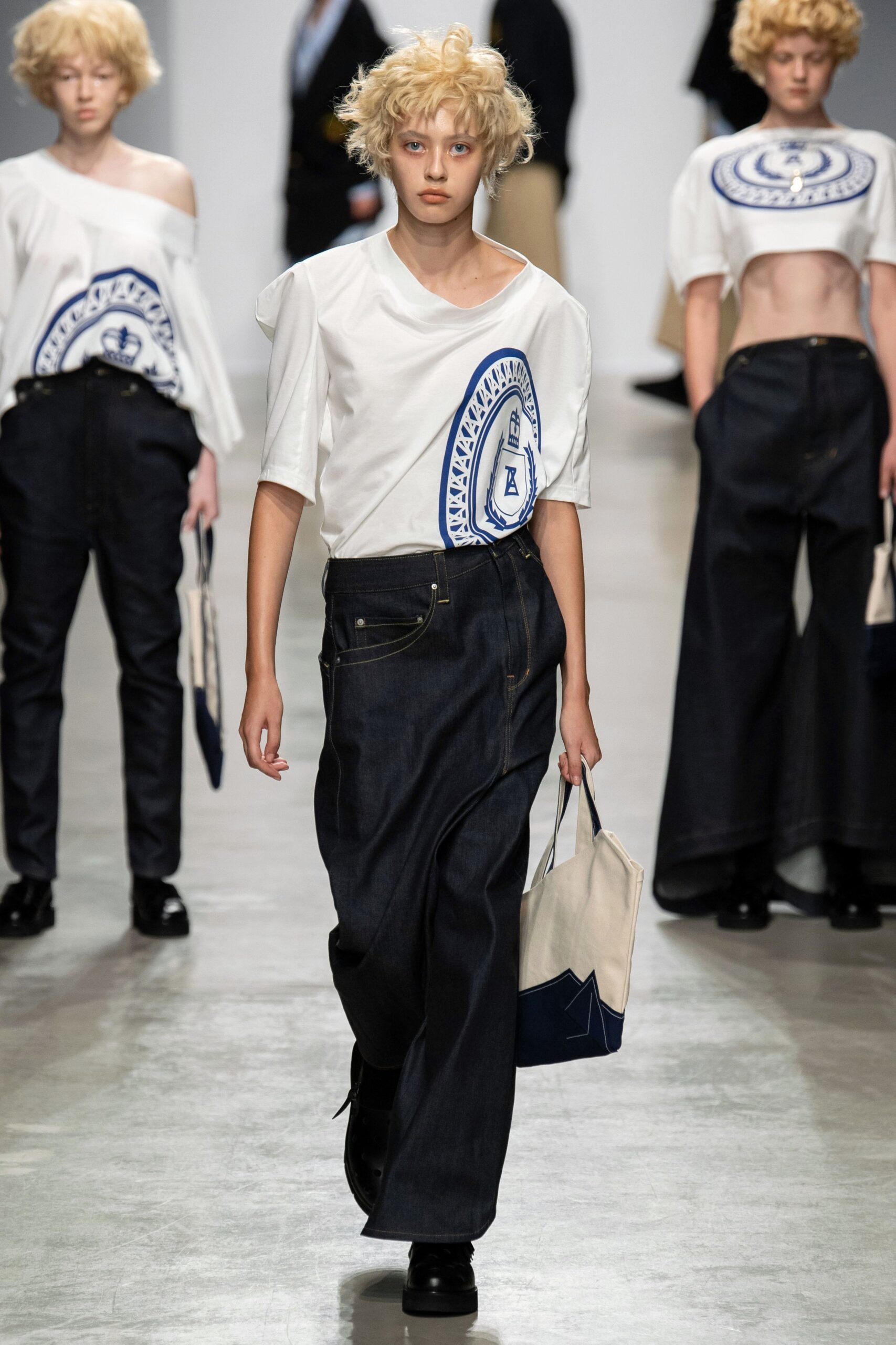 relaxed white top with wide-leg jeans