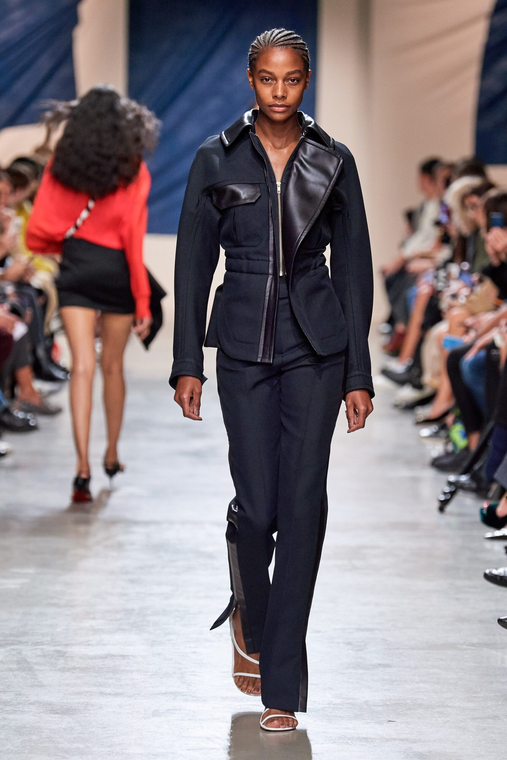 black fitted jacket and tailored pants