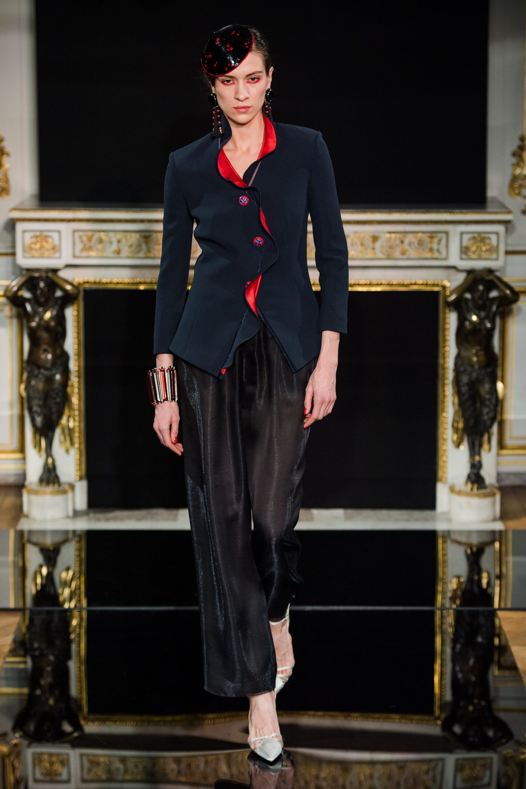 black tailored blazer with red accents