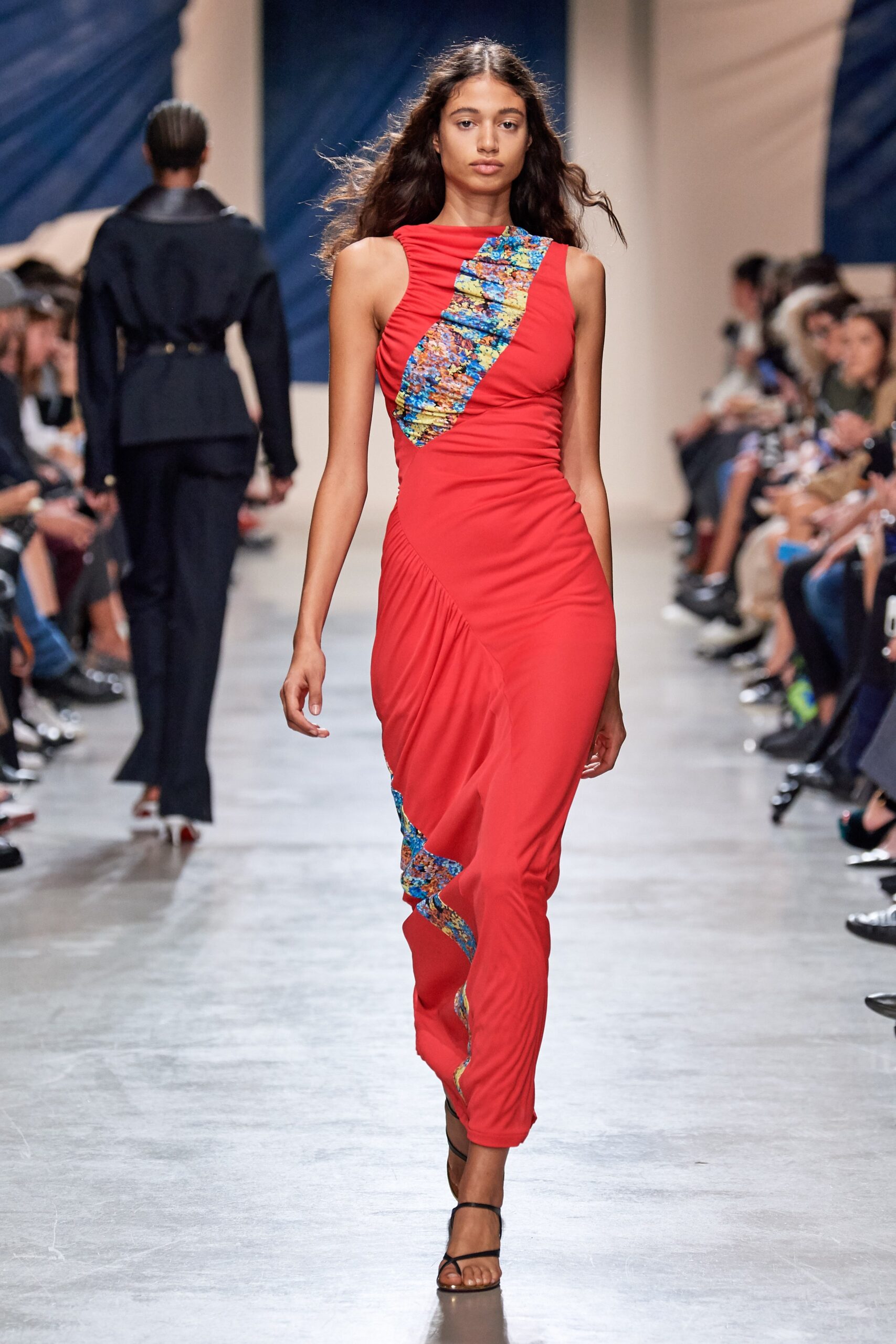 fitted red sleeveless dress