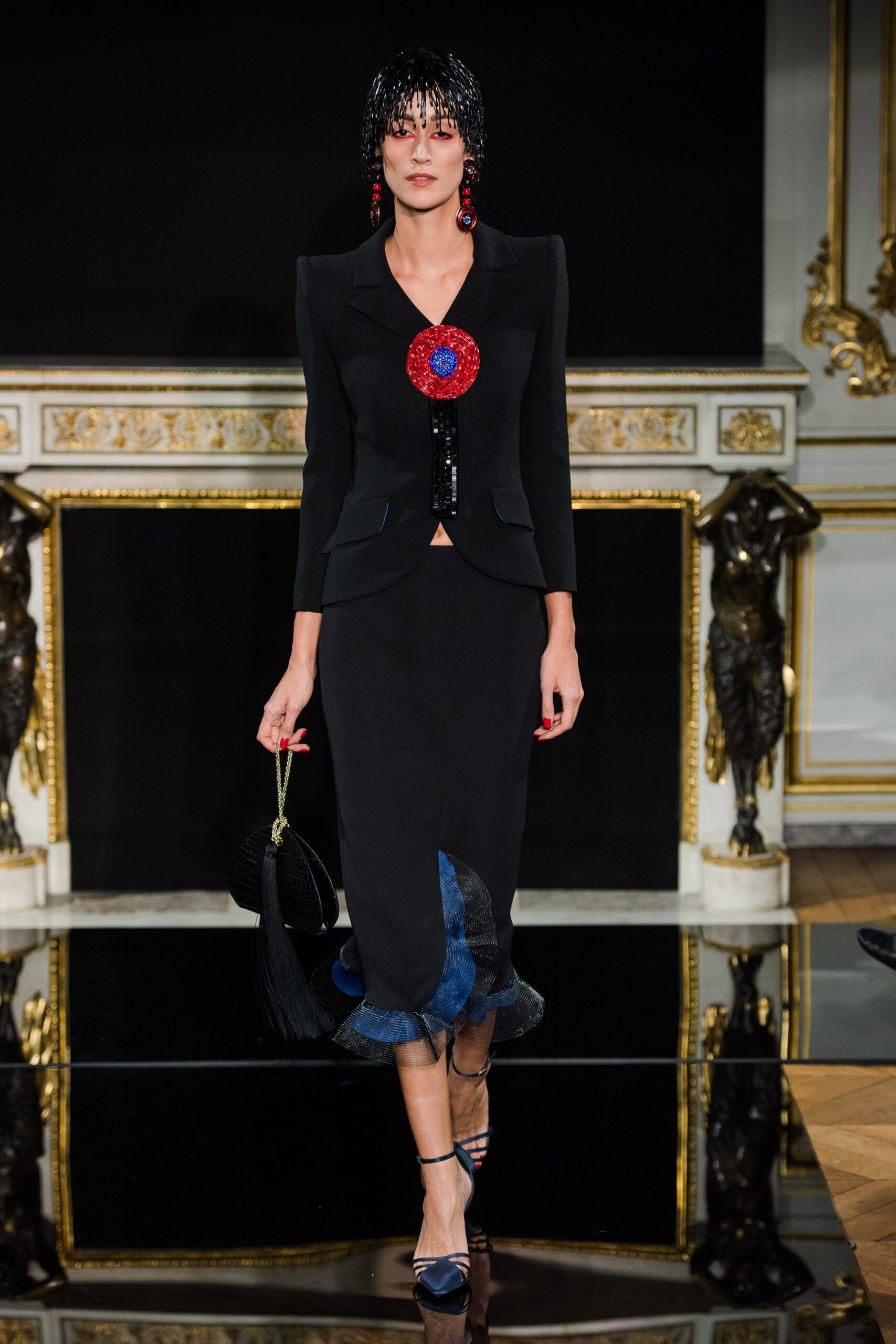 black silk structured blazer and fitted skirt