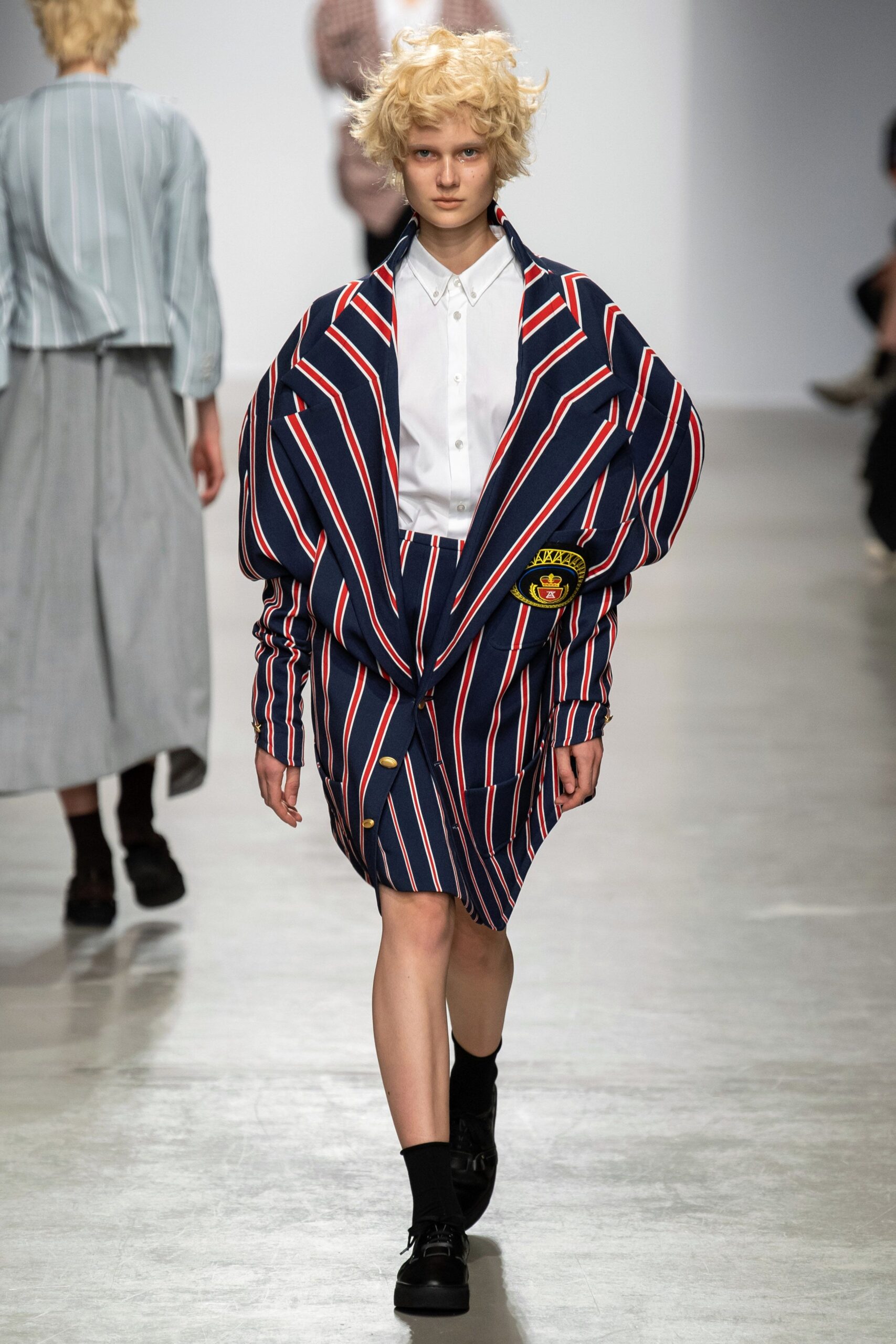 oversized striped blazer with fitted skirt