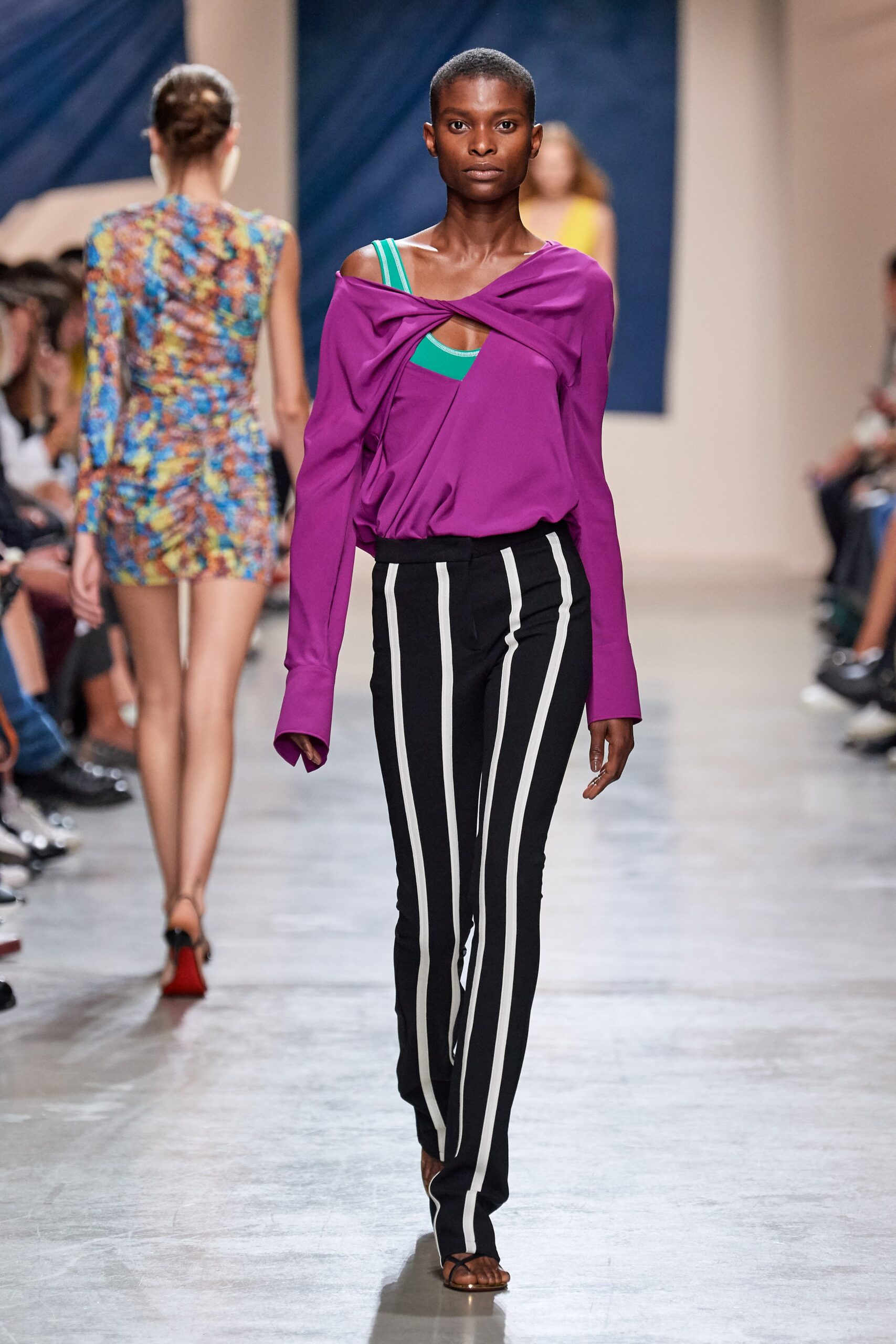 purple off-shoulder top with striped pants