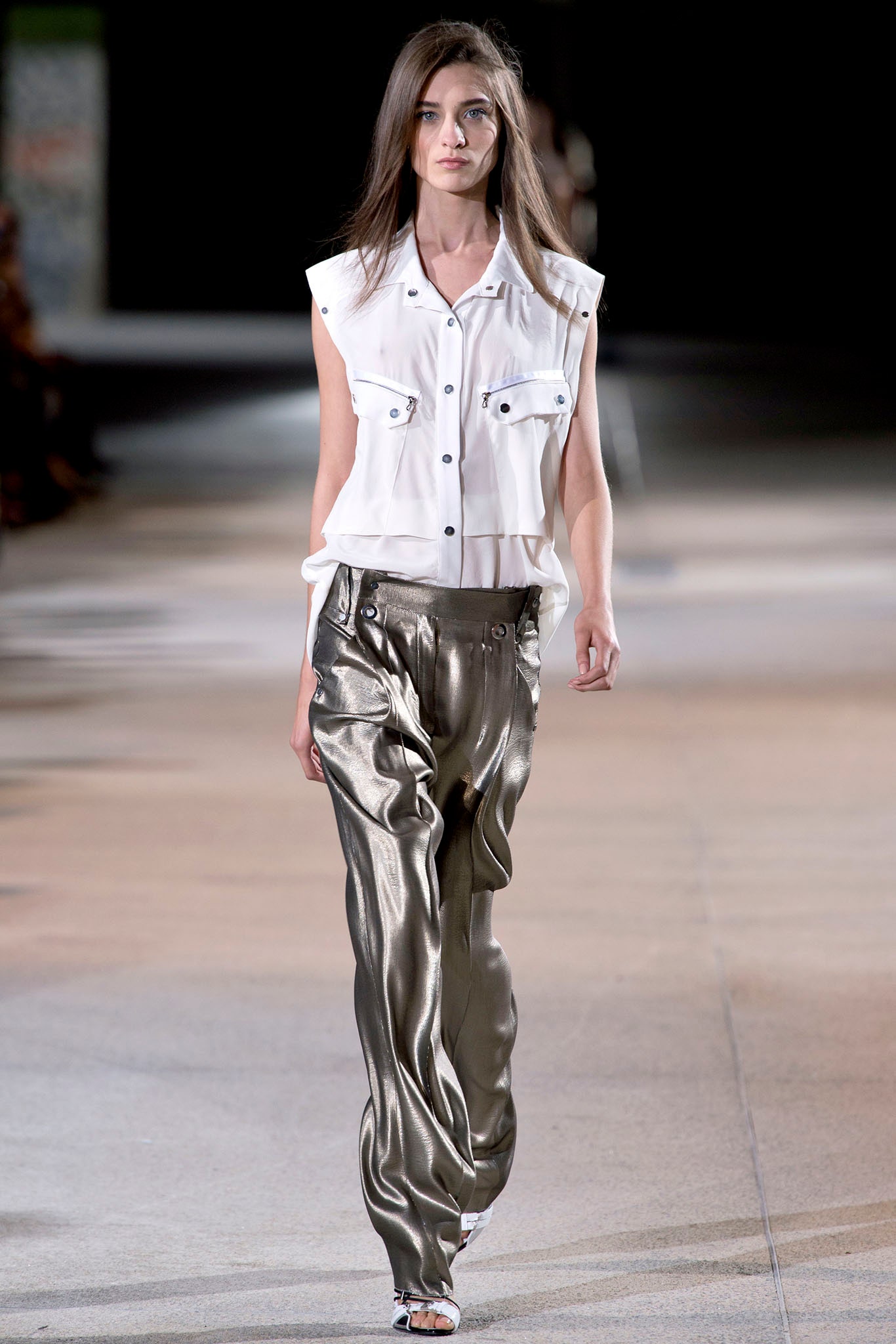 white relaxed shirt with gold pants