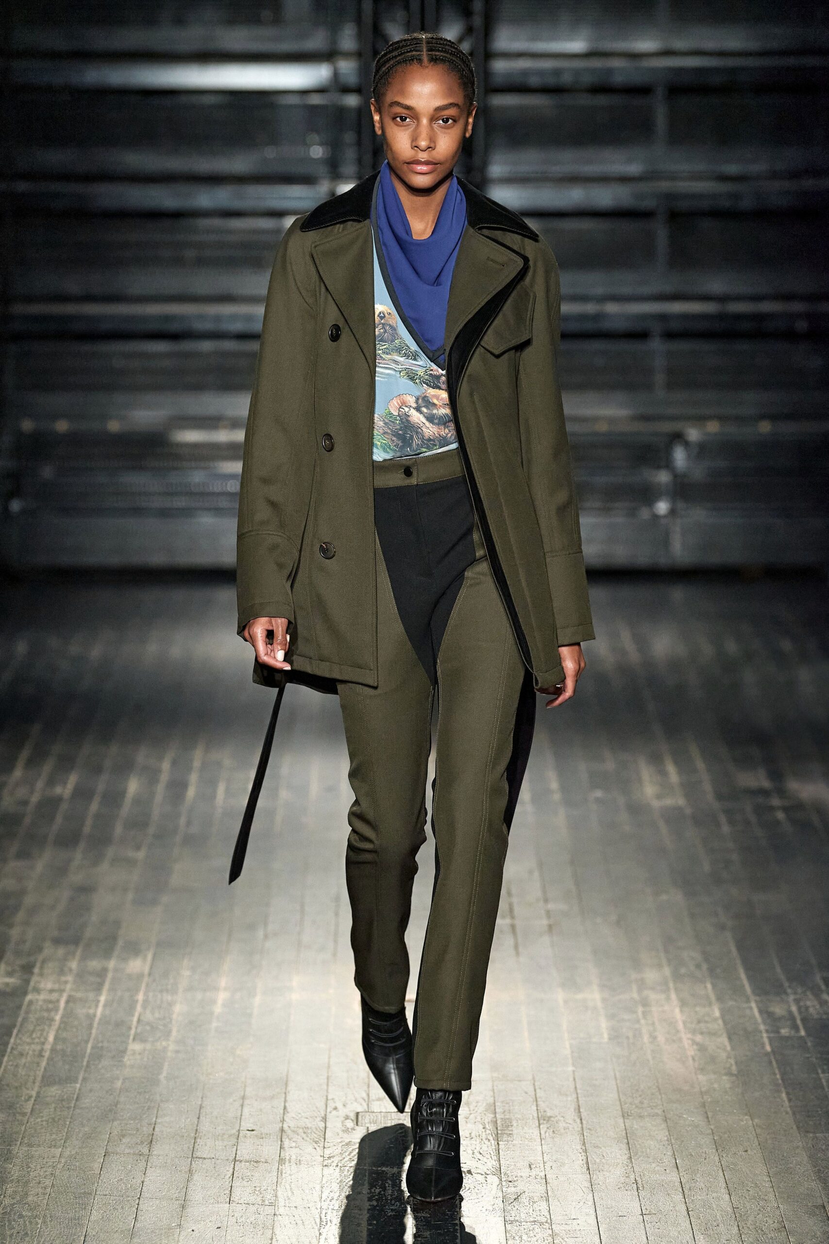 green wool coat with black pants