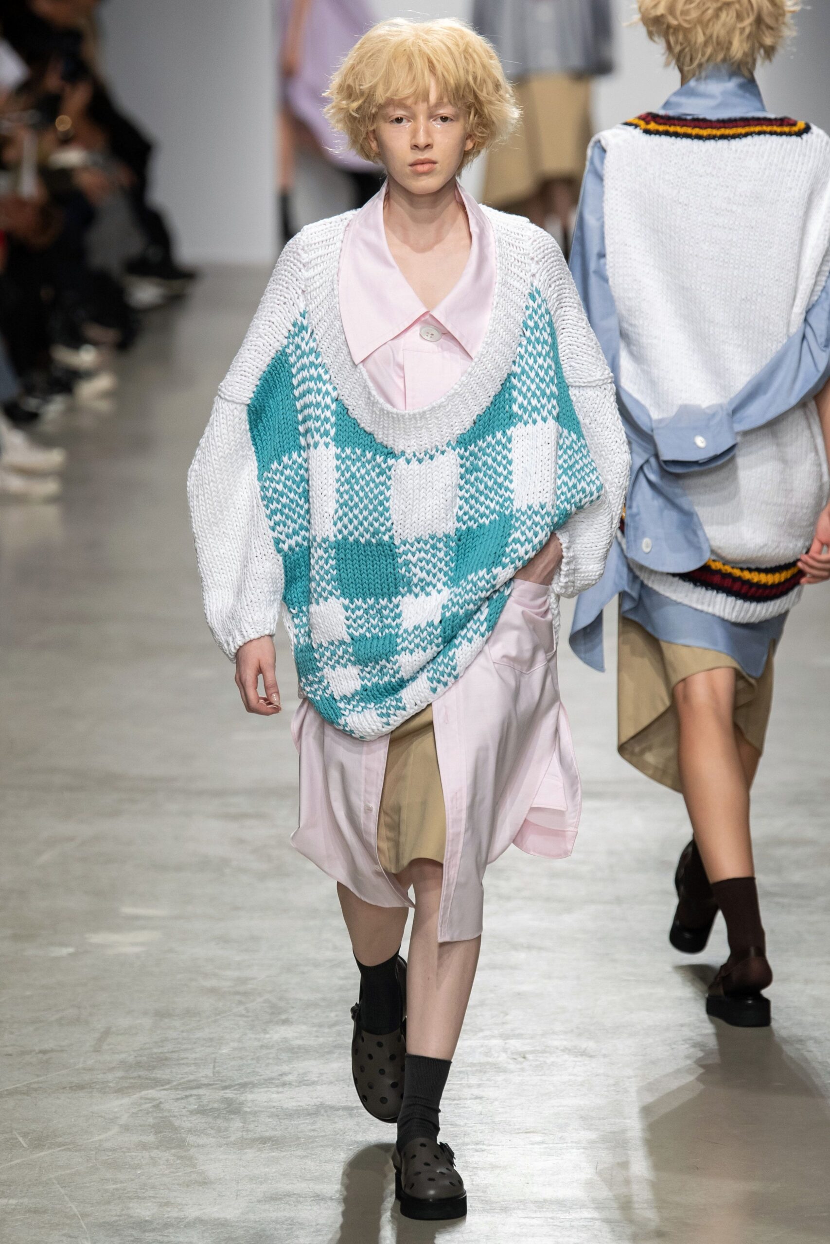 oversized teal and white sweater with pink dress