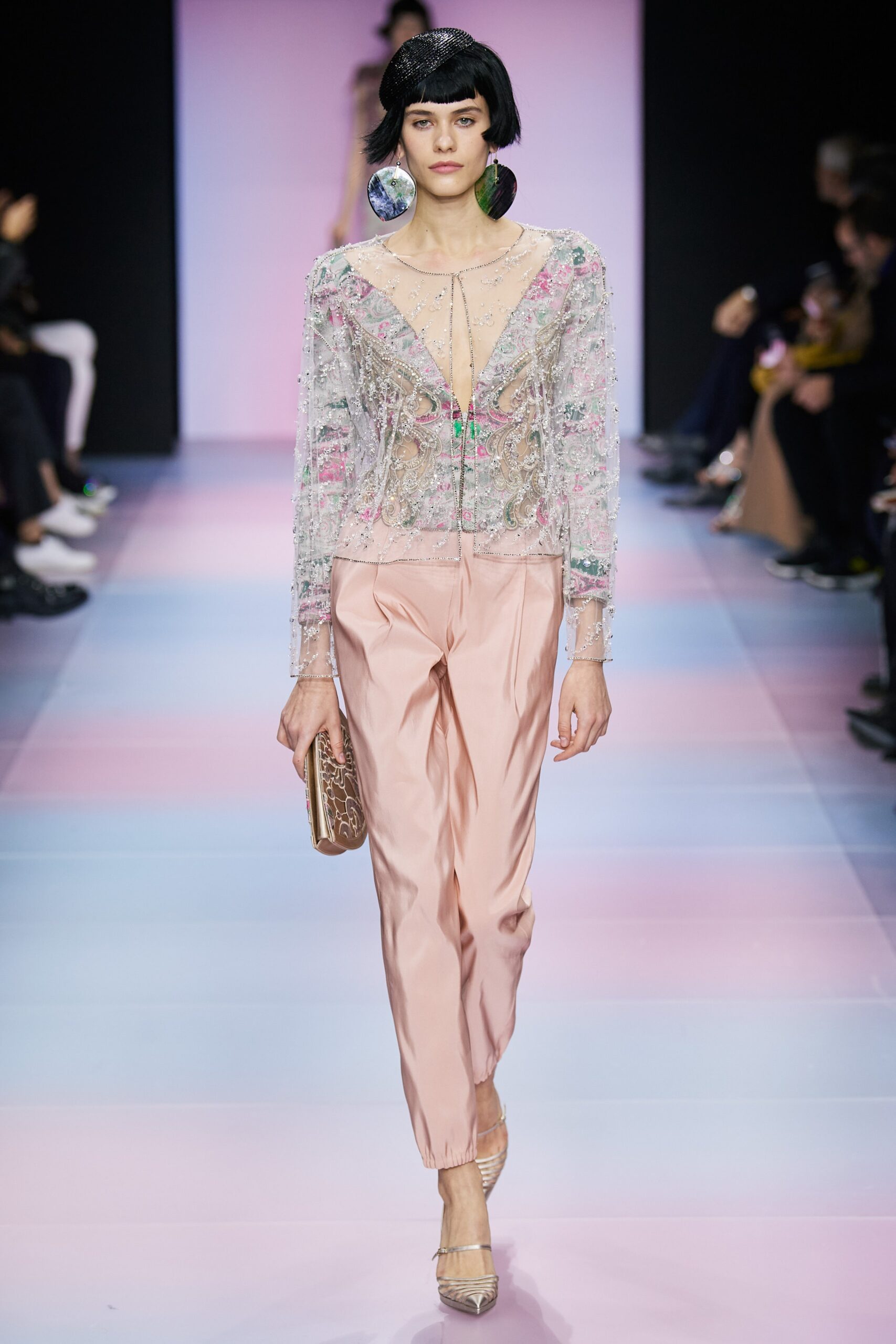 pink embroidered blouse with tailored pants