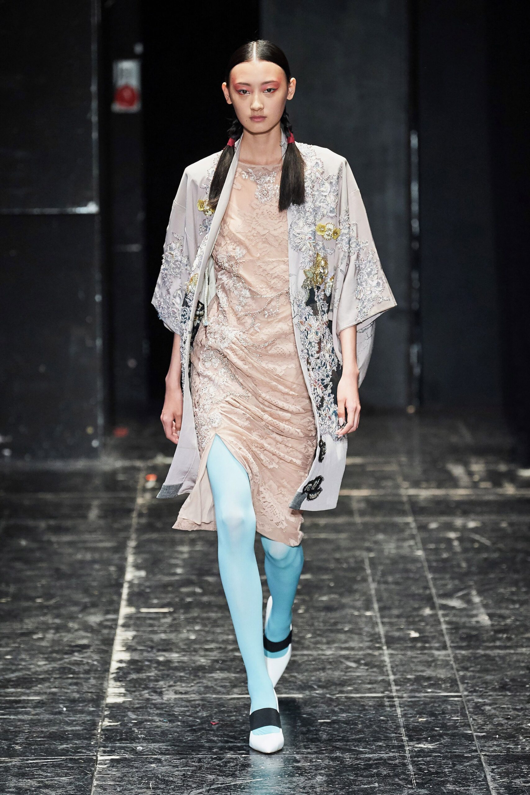 beige silk embroidered dress with gray coat