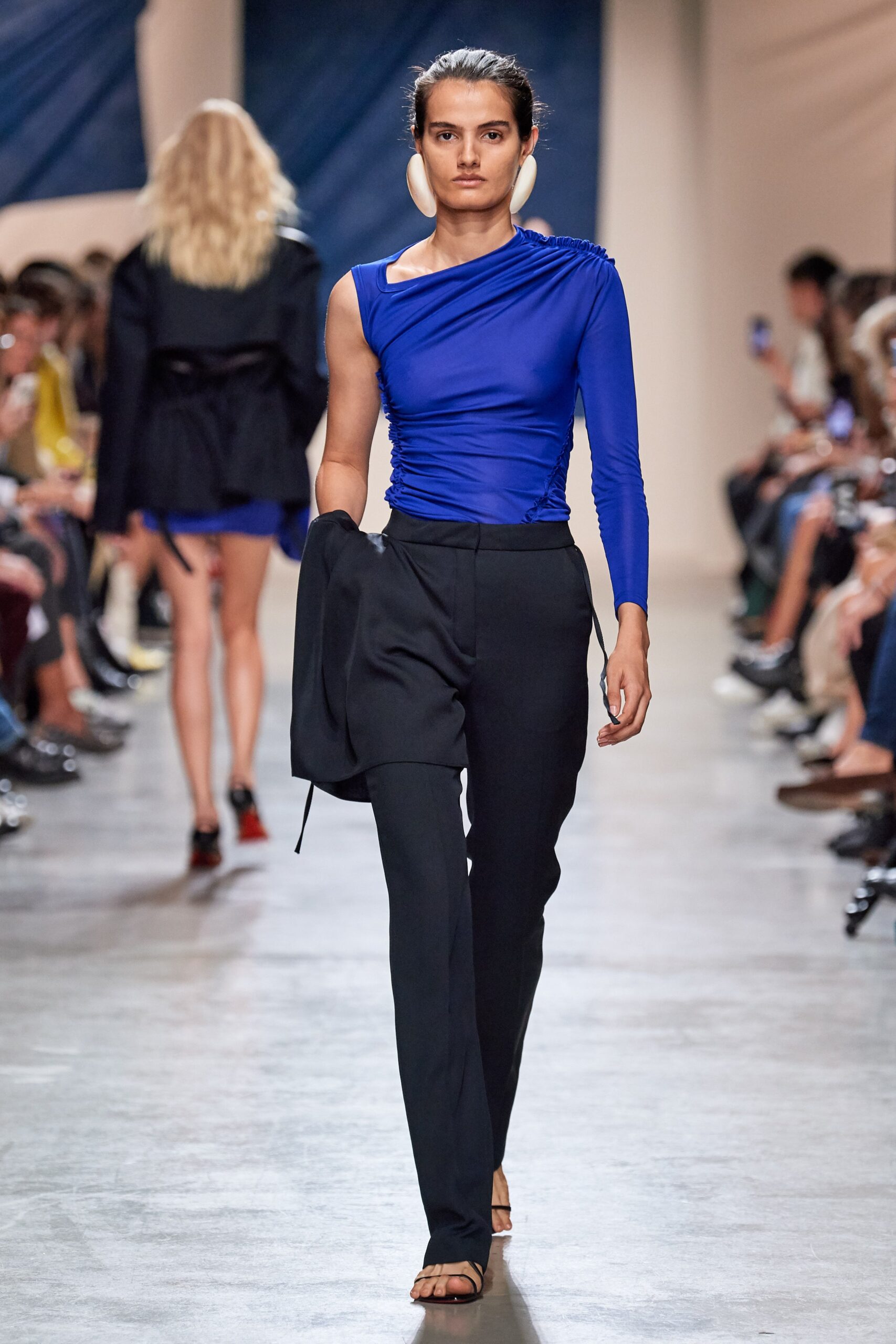 blue fitted top with tailored pants