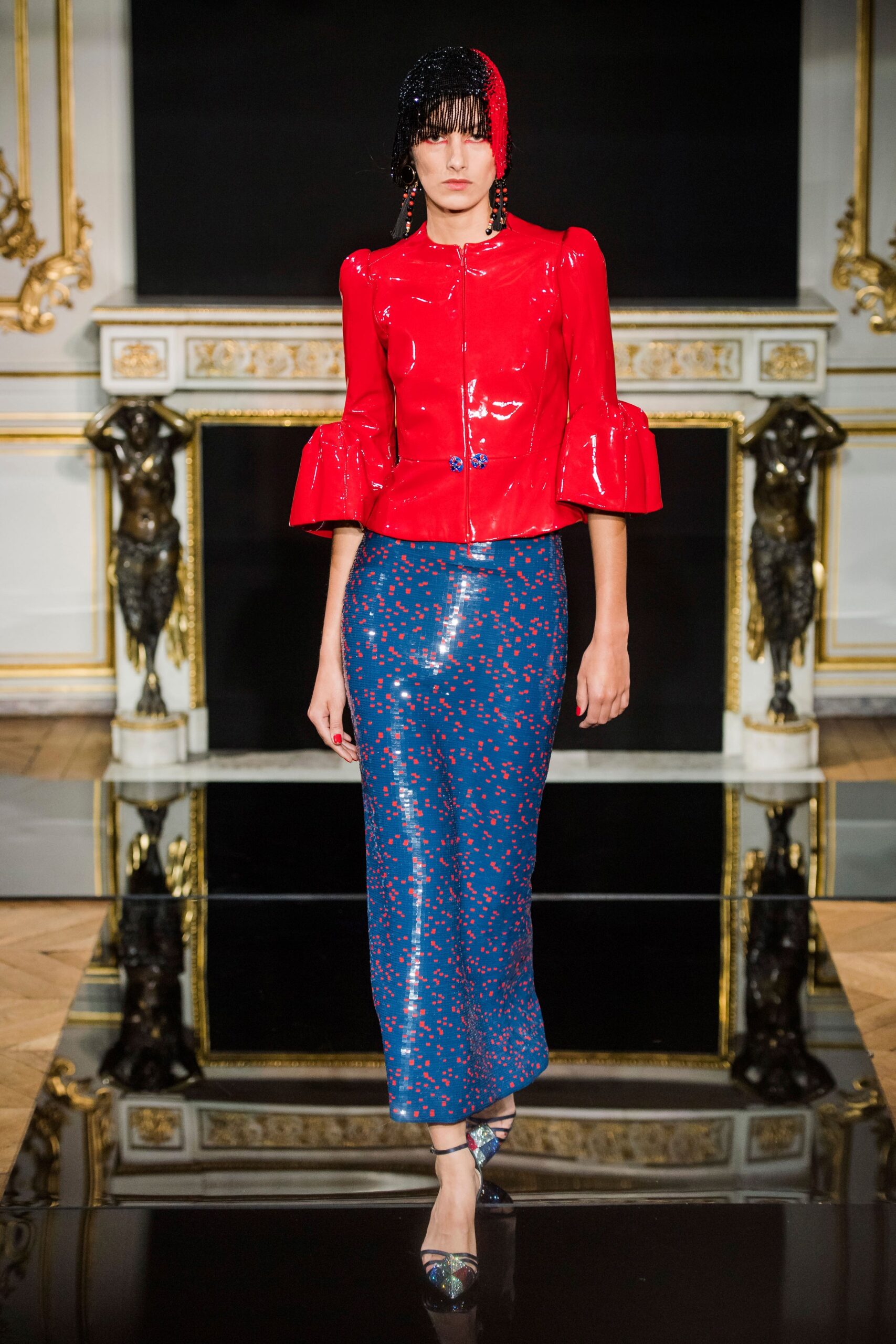 red vinyl fitted jacket and blue pencil skirt