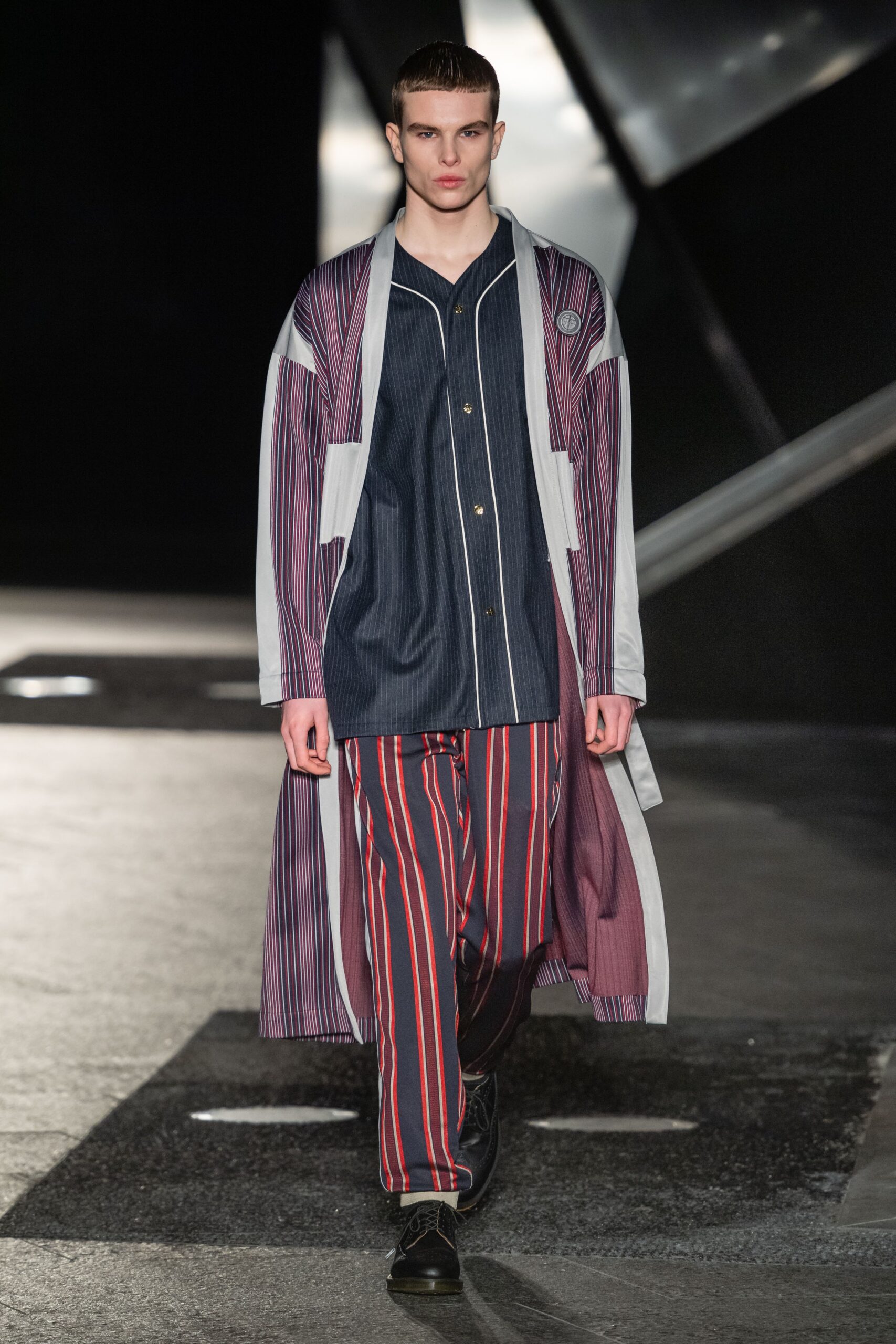 purple and blue striped coat with shirt and pants