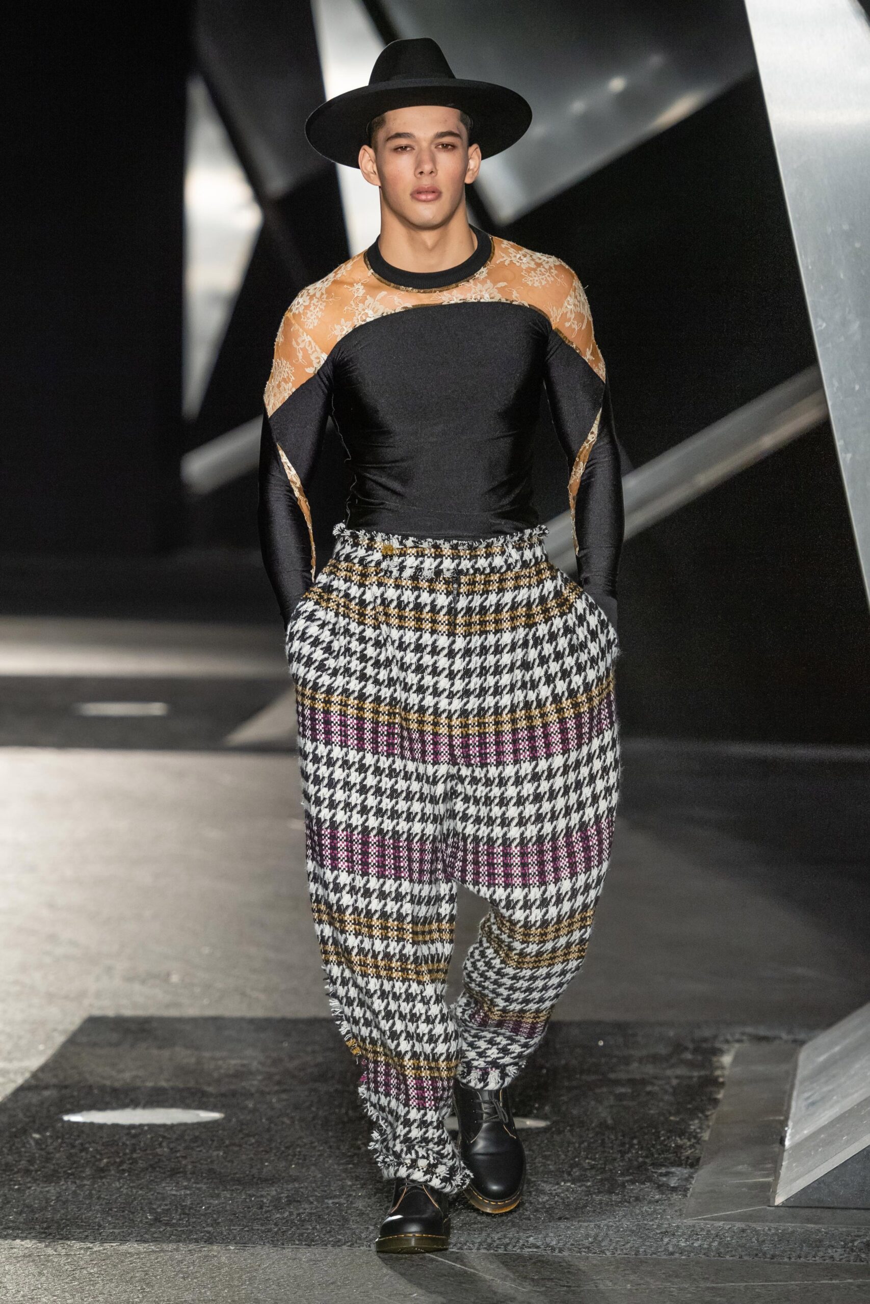 black and orange layered top with relaxed pants