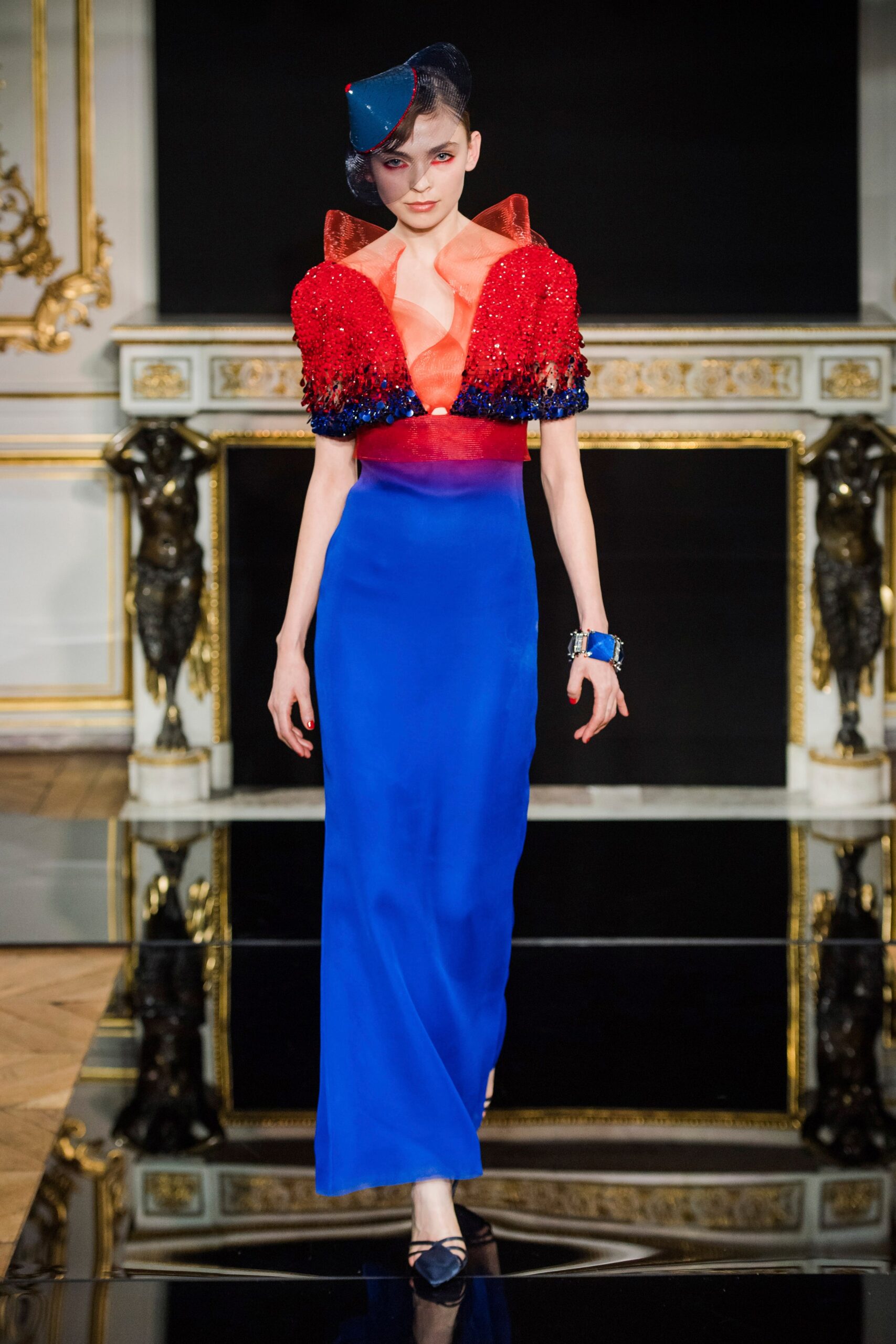 blue silk gown with sequined jacket