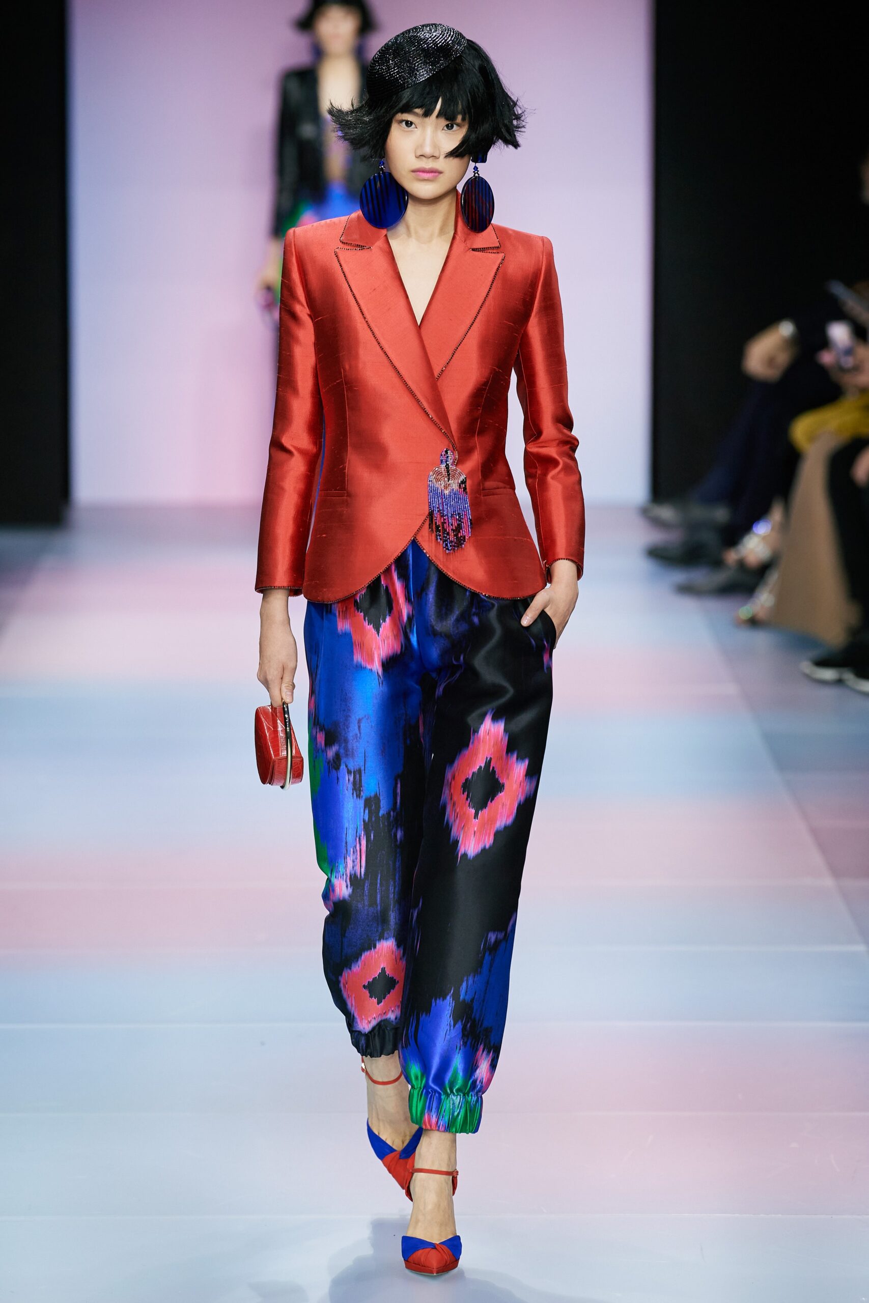 red silk blazer with printed pants