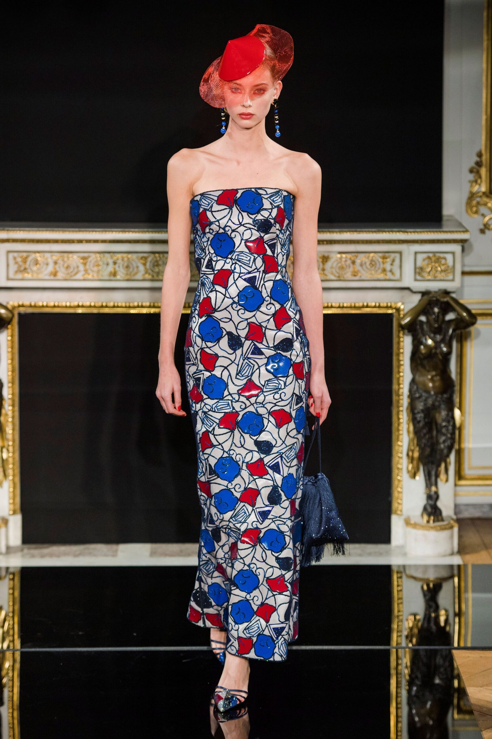 red silk strapless fitted printed maxi gown