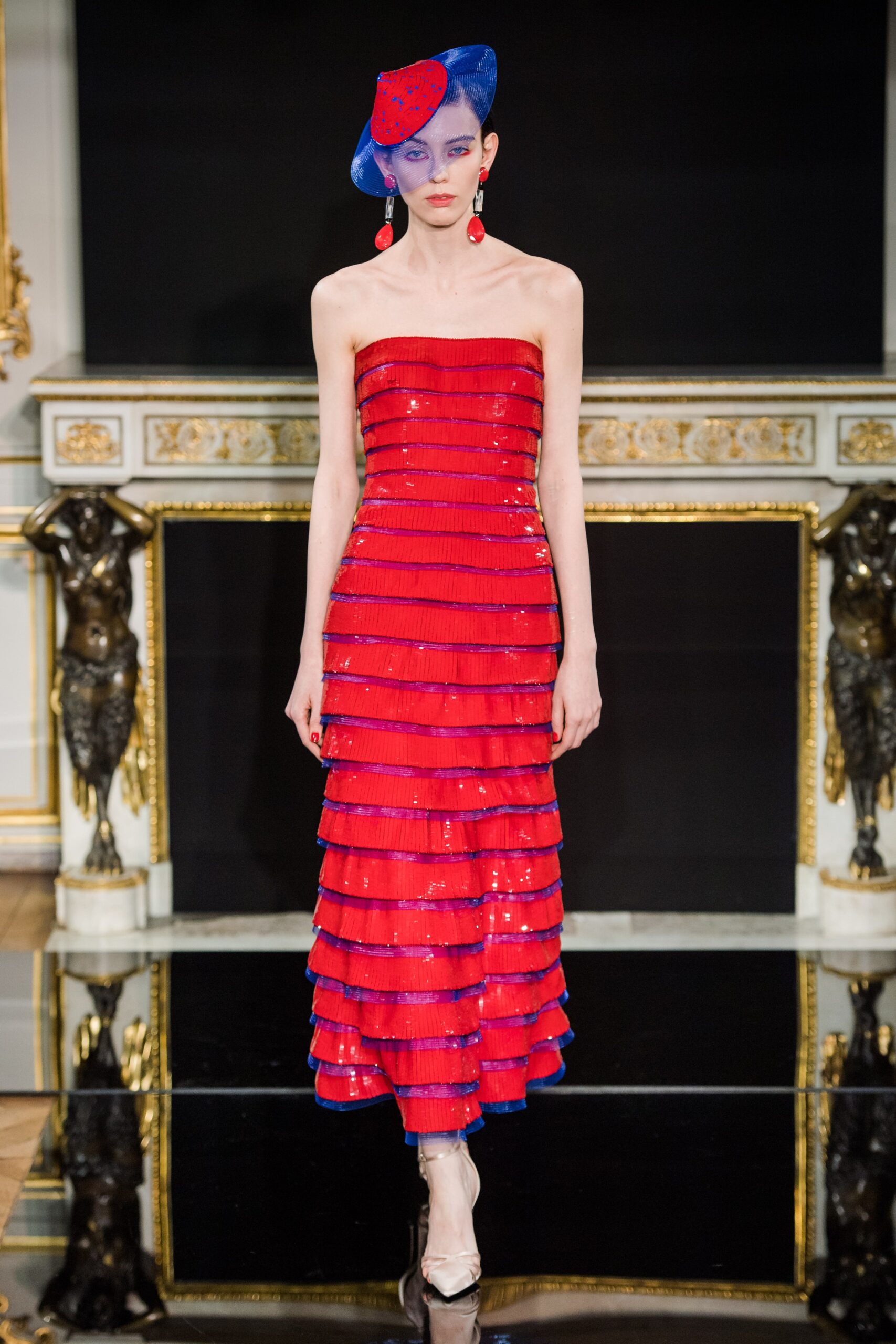 red strapless sequined gown