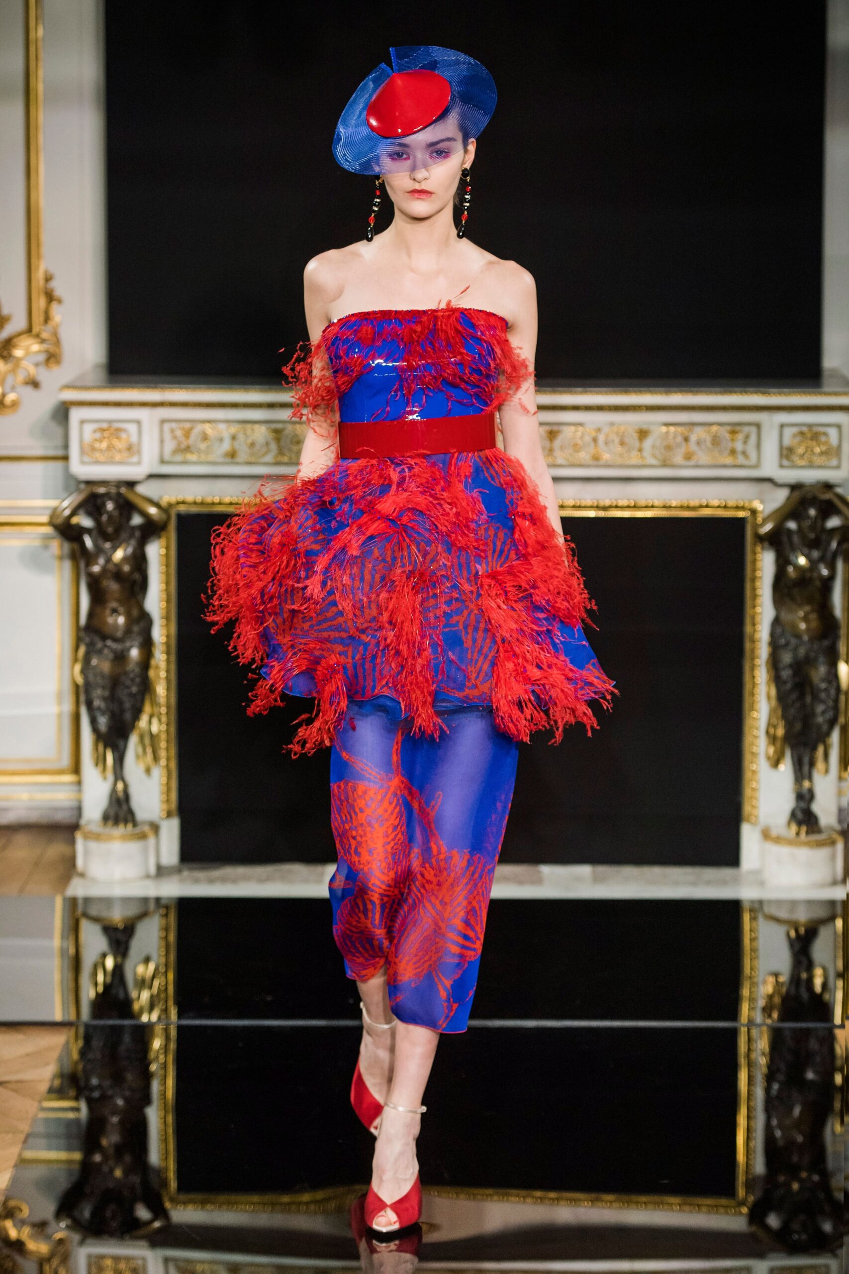 red silk strapless fitted ruffled layered flowing dress