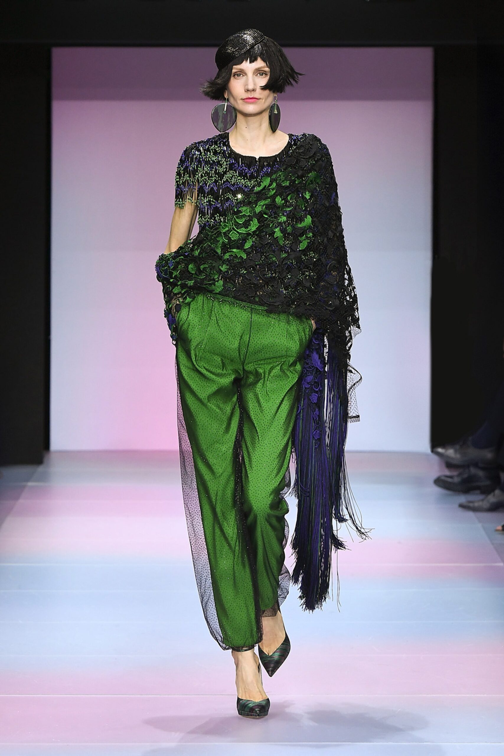 green layered top with tailored pants