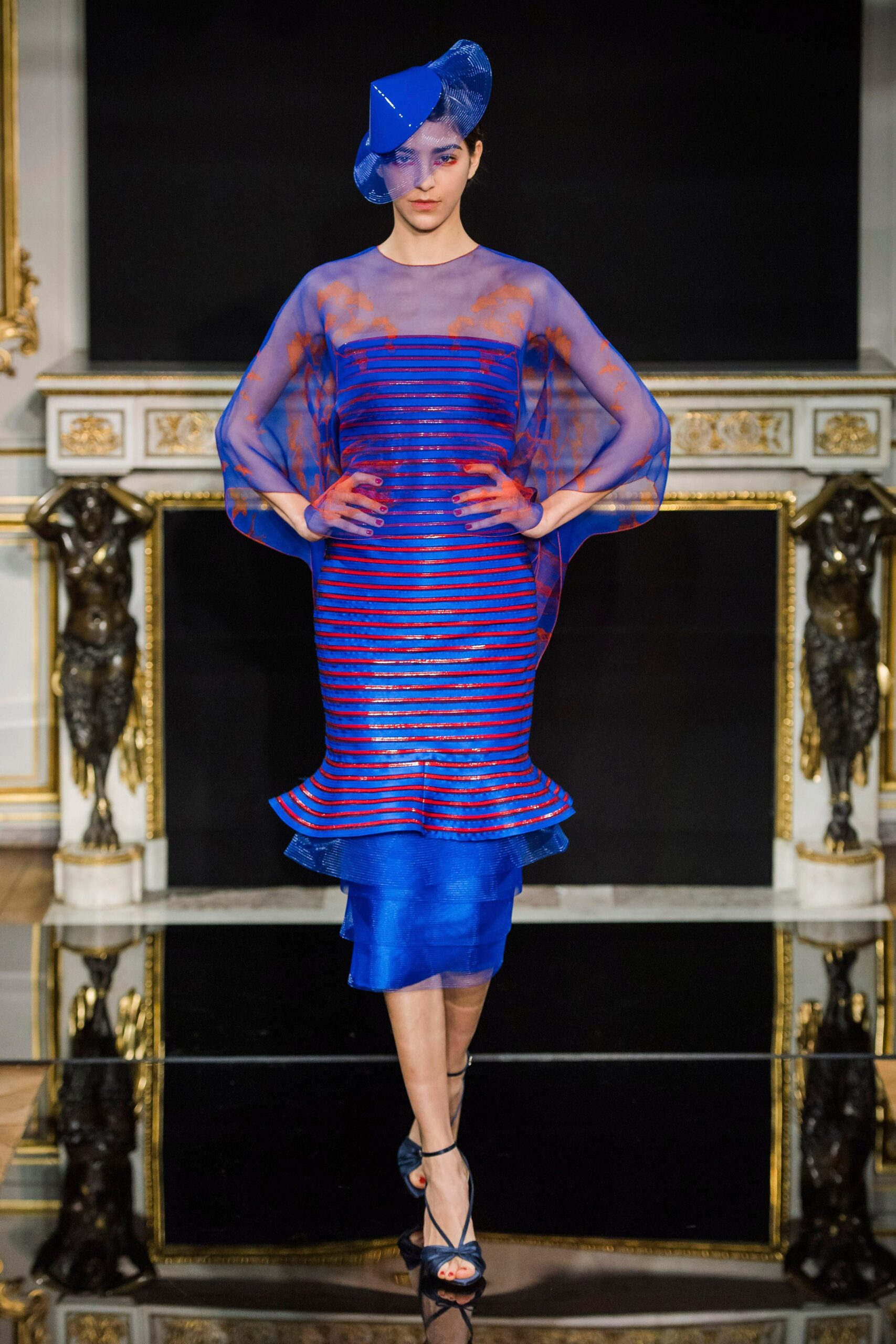 blue silk sleeveless high-neck fitted striped flared dress