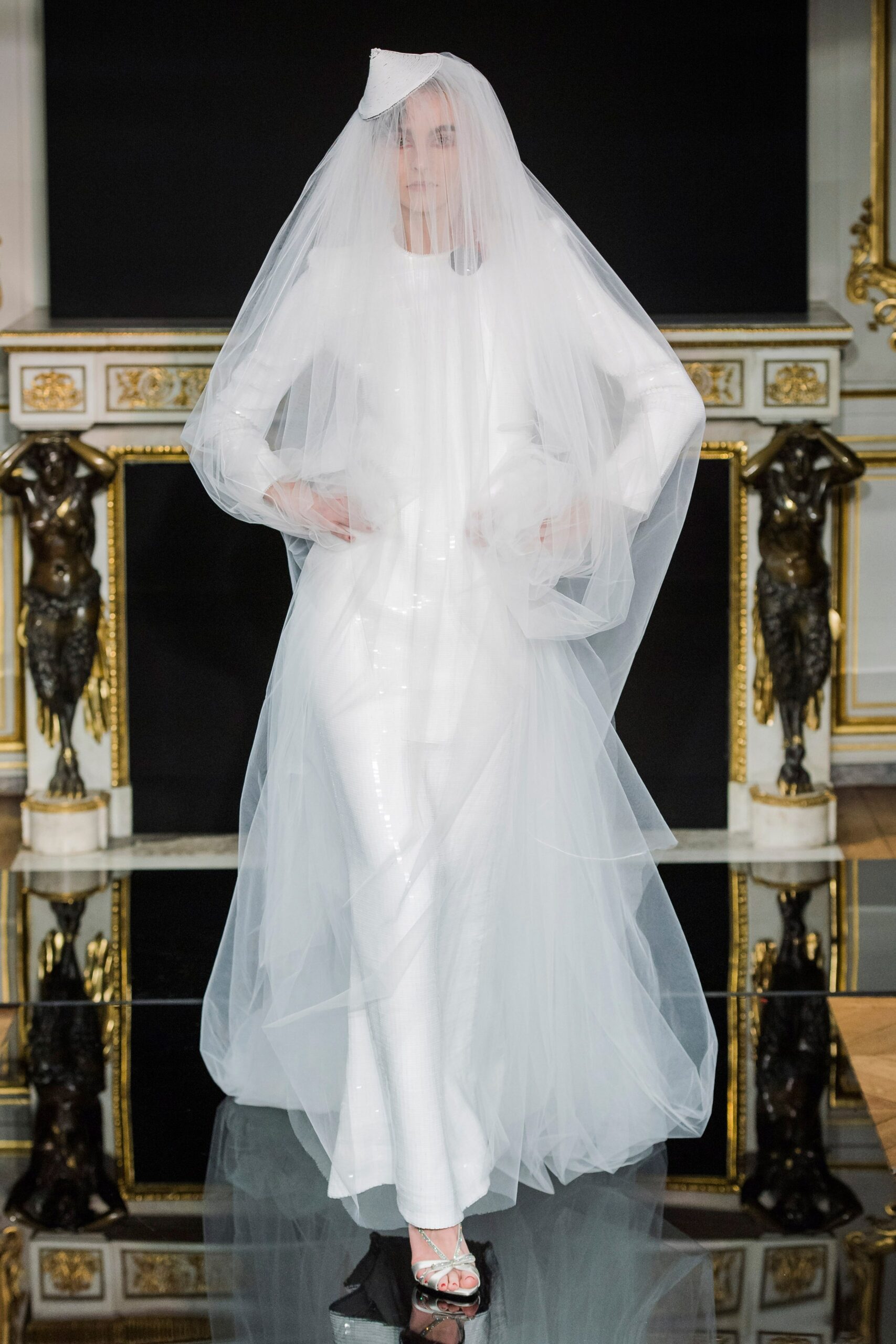 white silk fitted gown with veil