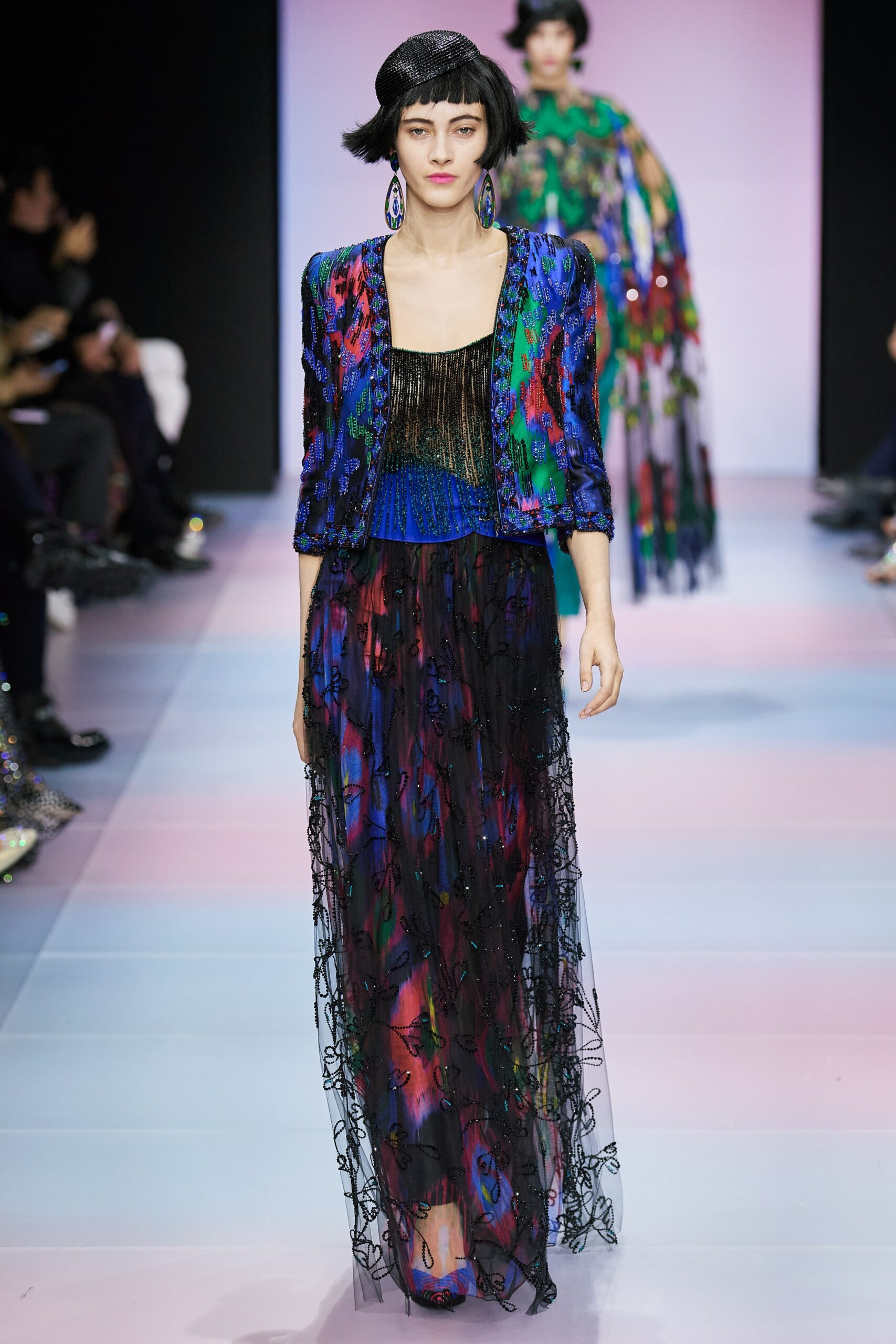 colorful layered gown and structured jacket