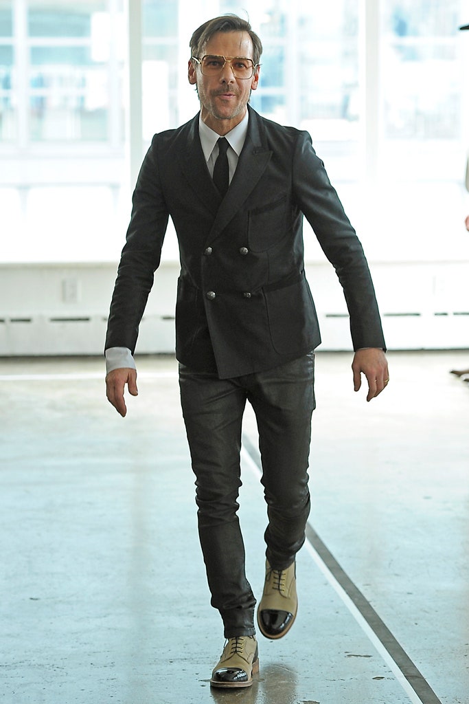 black tailored blazer with slim pants