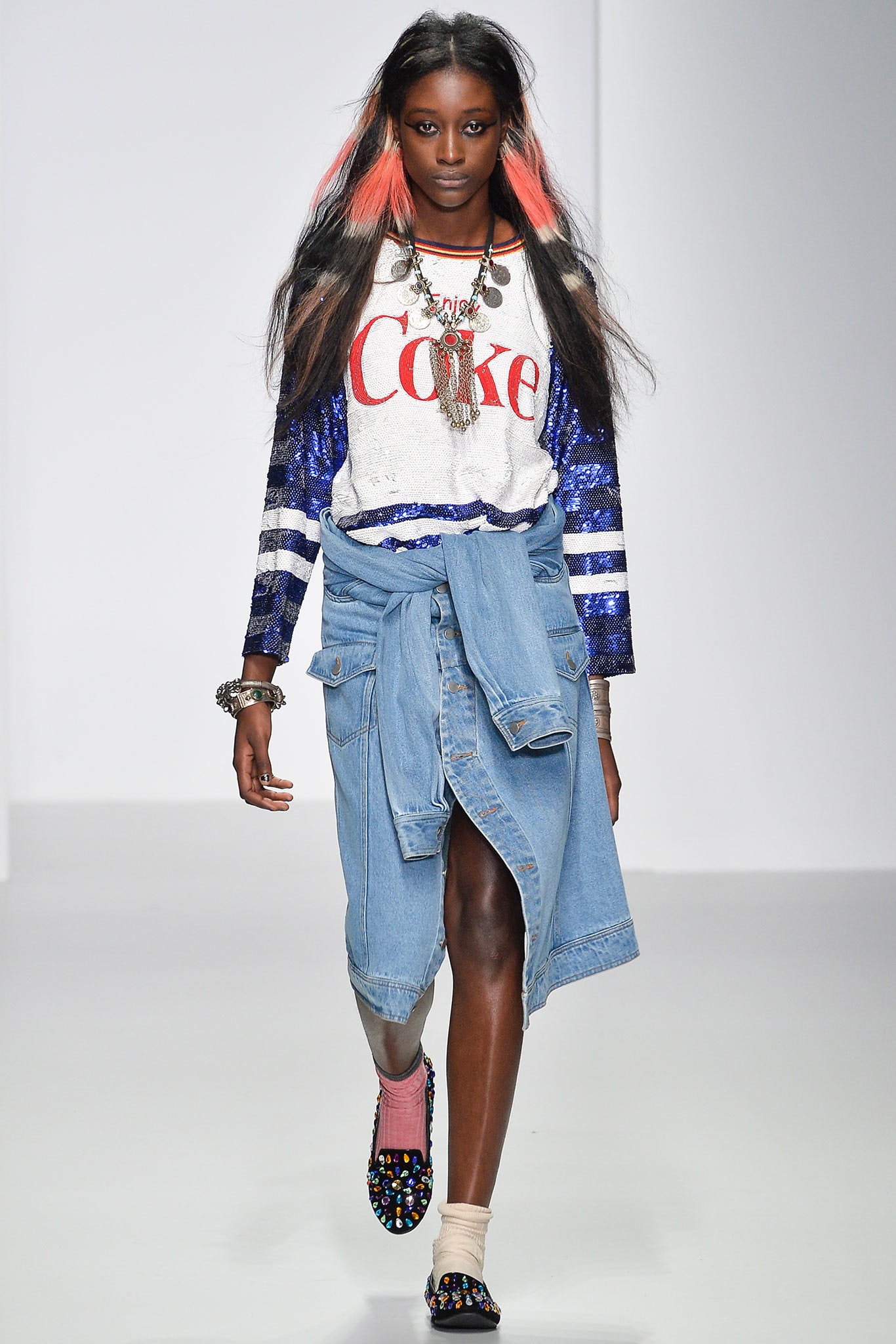 relaxed sweater and denim skirt