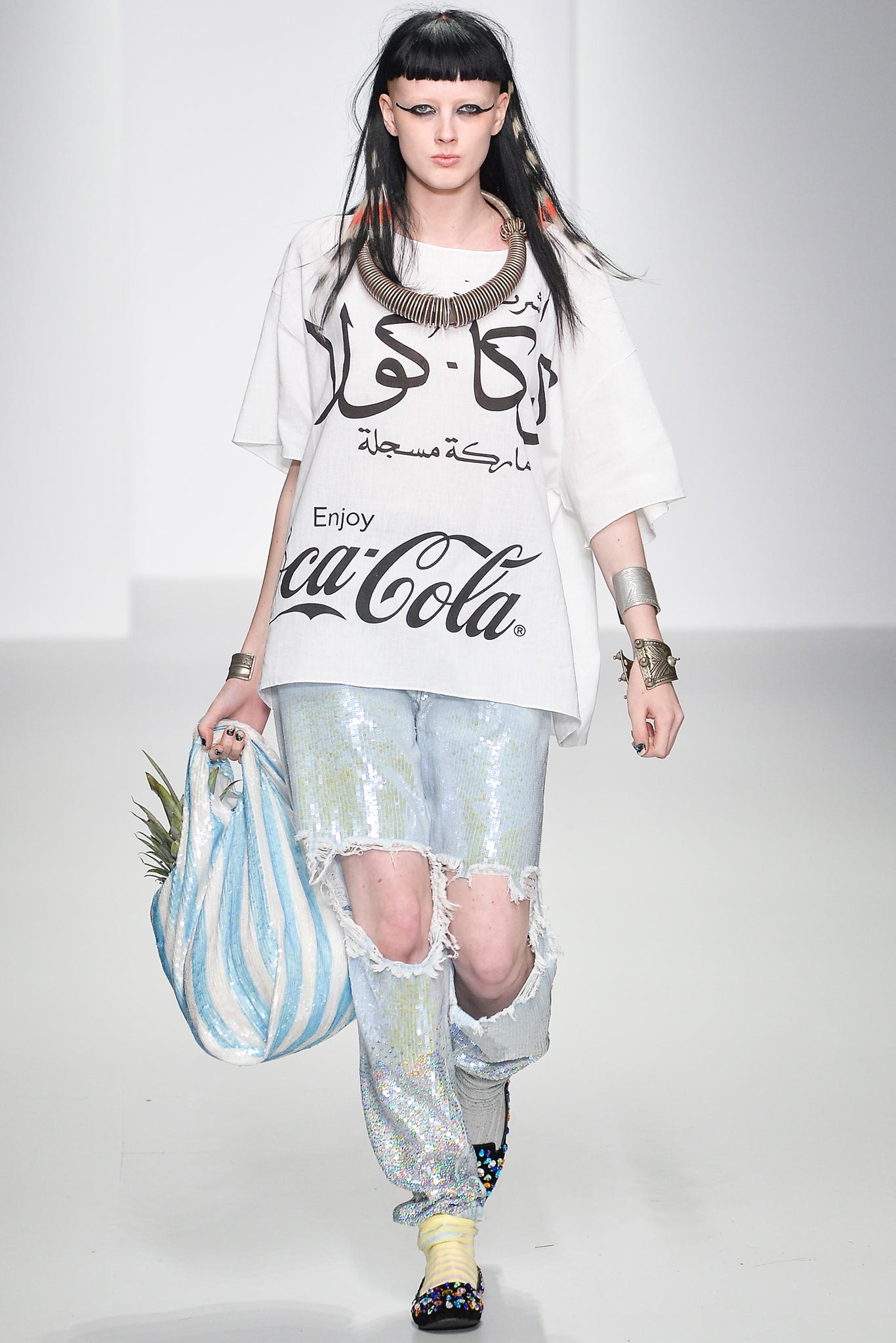 oversized white t-shirt with distressed jeans