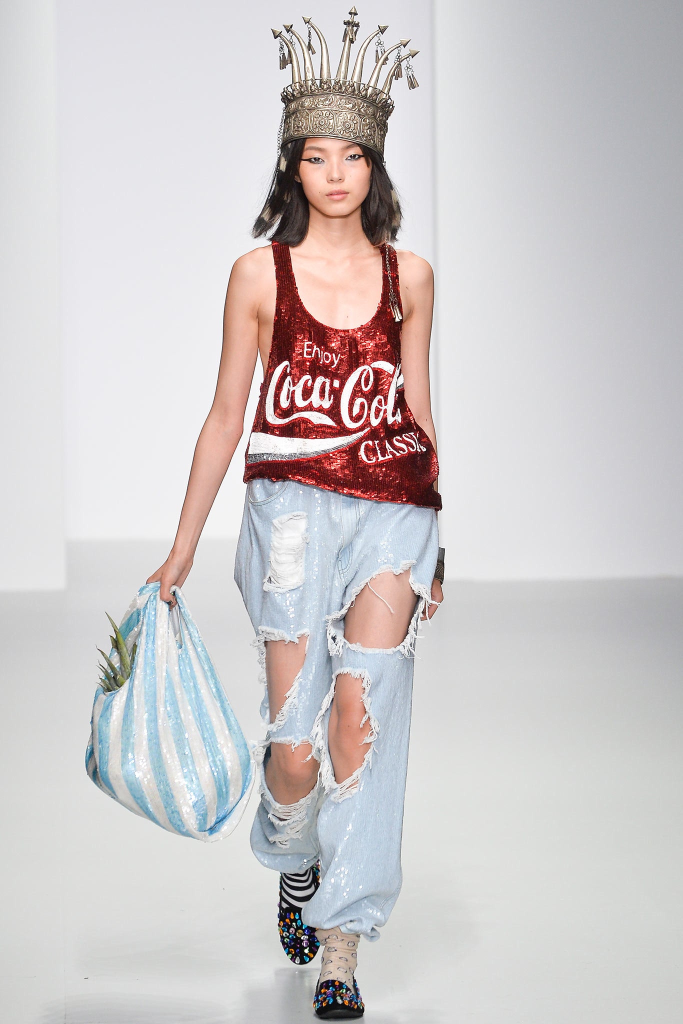 red sequin top with distressed jeans