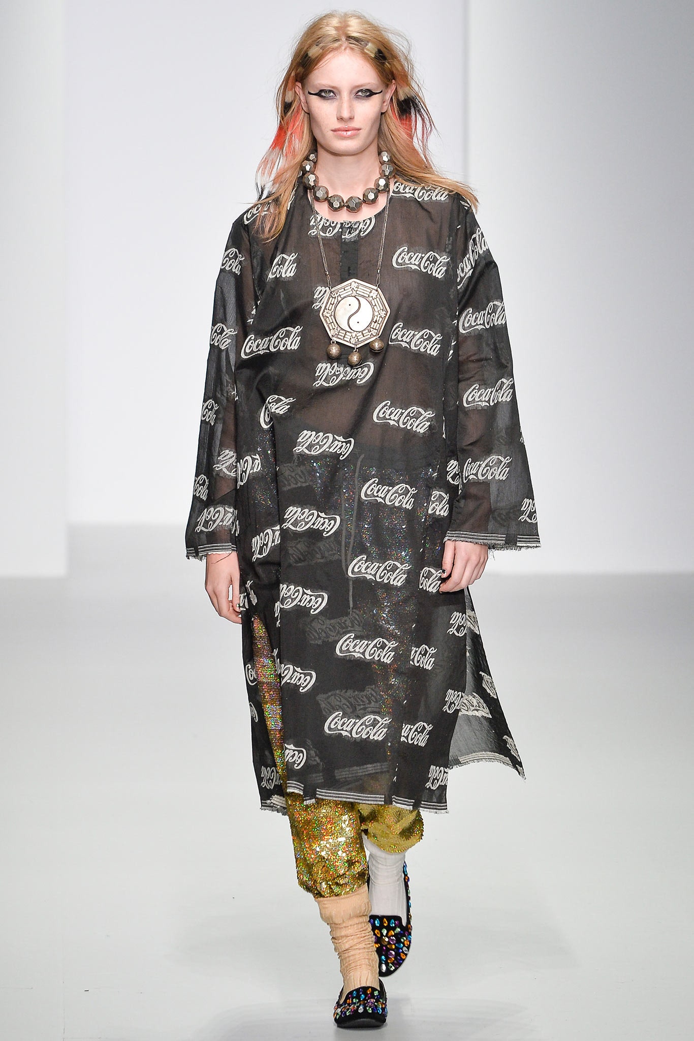 sheer black printed coat with flared pants