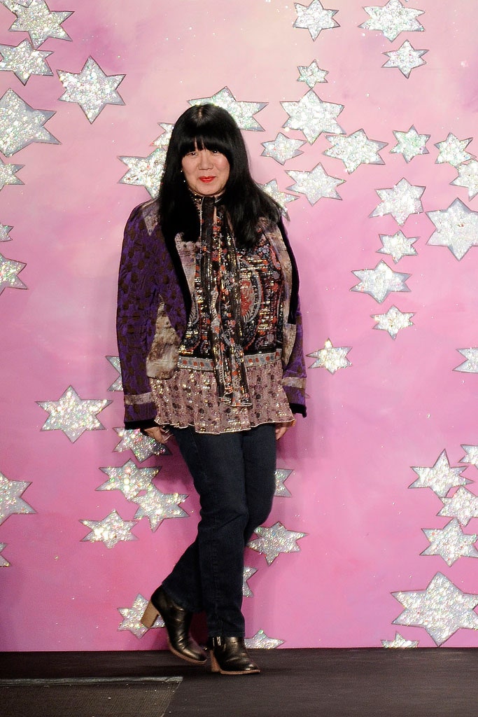 purple embroidered blouse with jeans