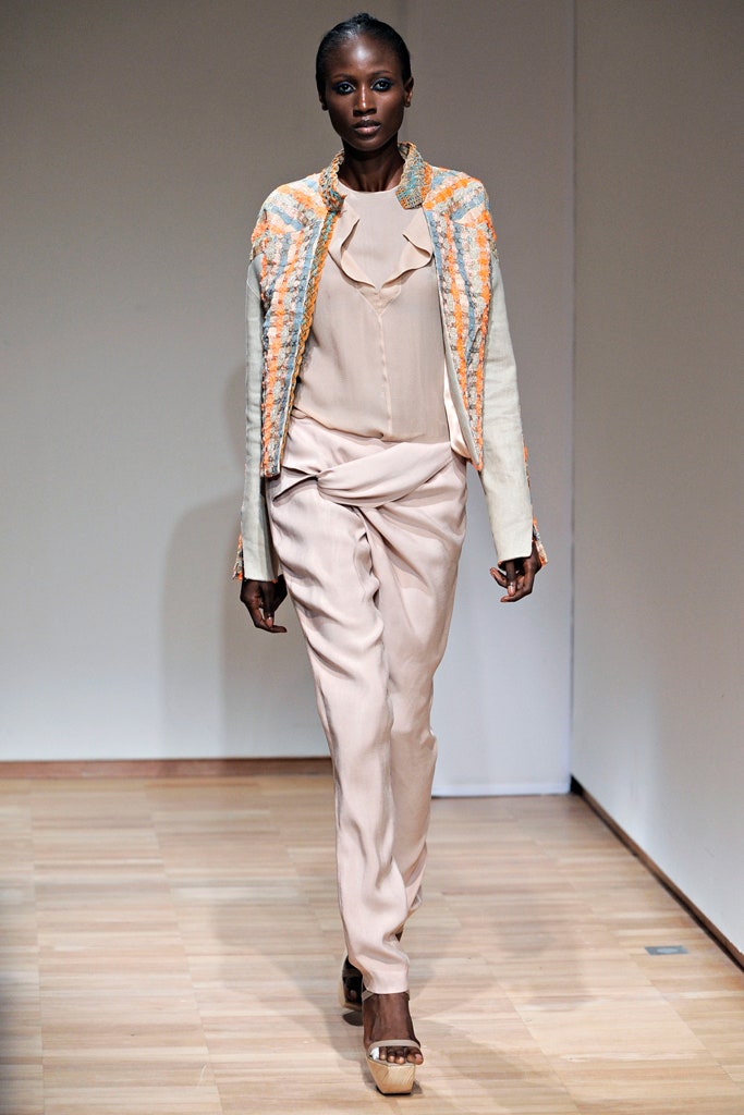 beige embroidered jacket with silk blouse and pants