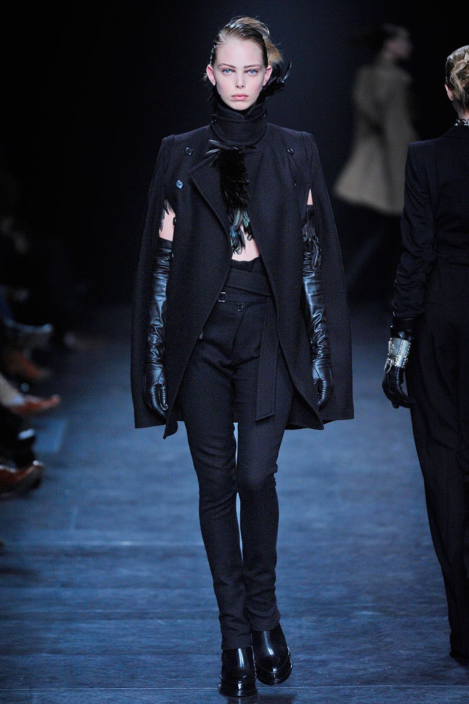 black fitted coat with slim pants