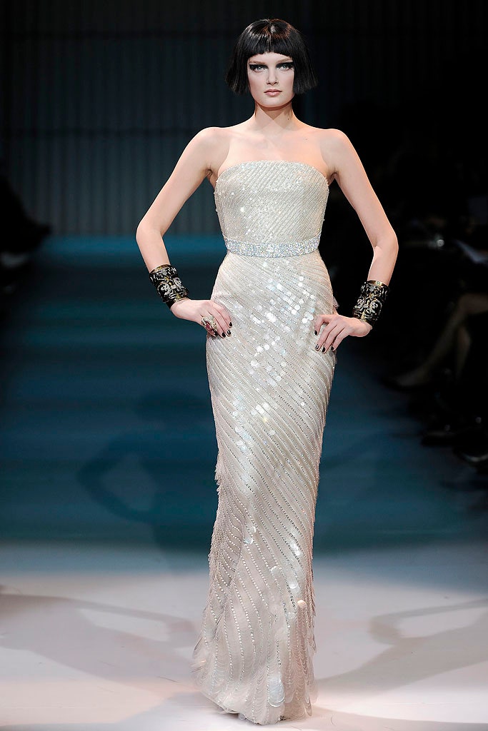 white sequined strapless gown