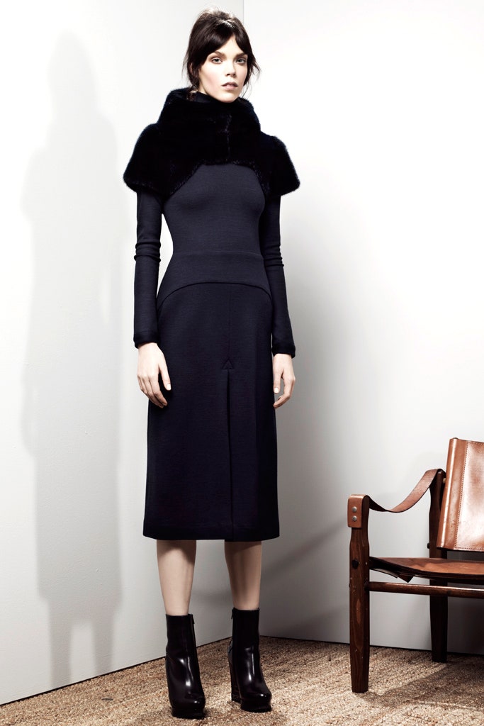 black fitted midi dress with fur cape