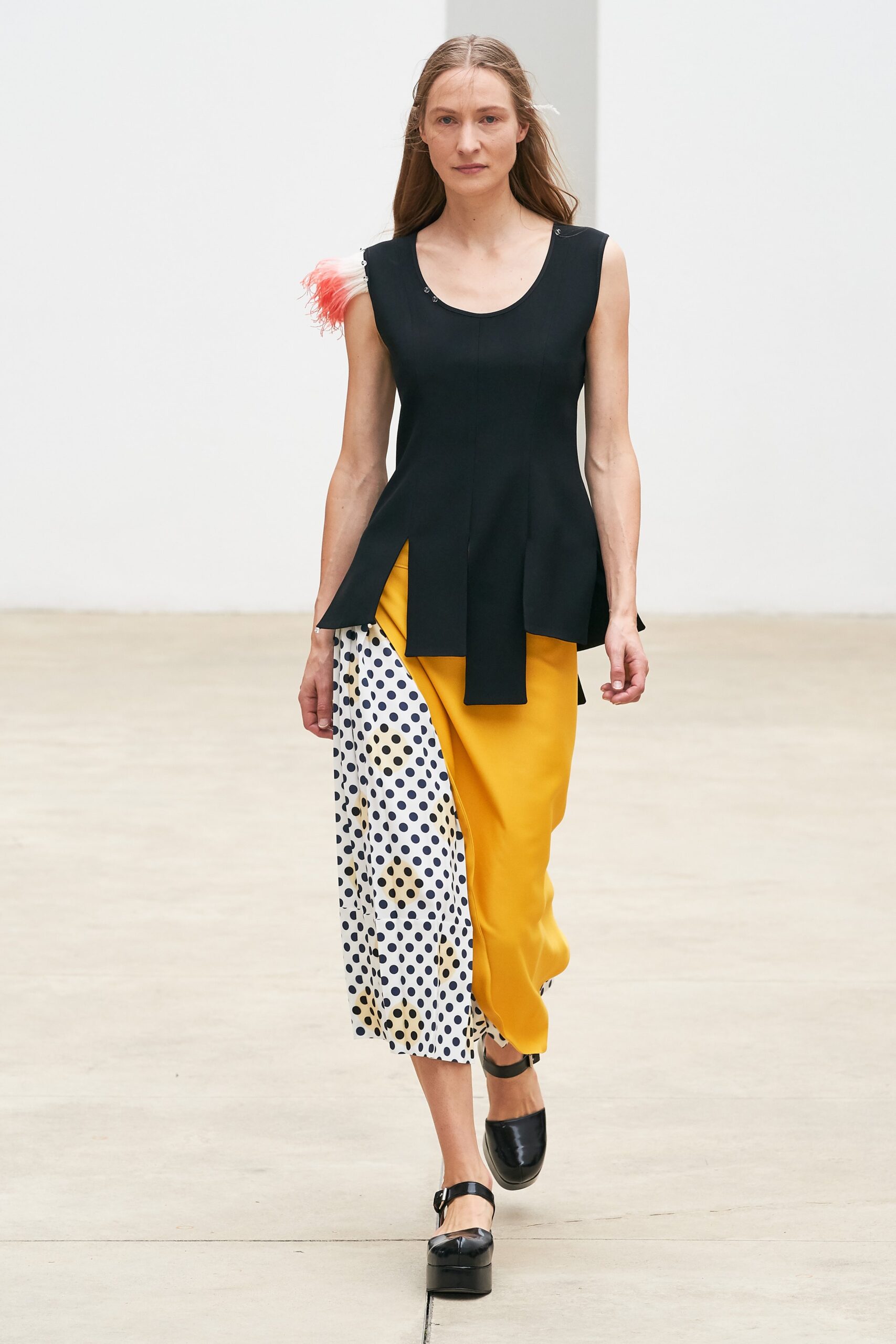 black fitted top with yellow skirt