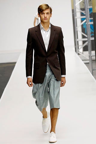 brown tailored blazer with gray shorts