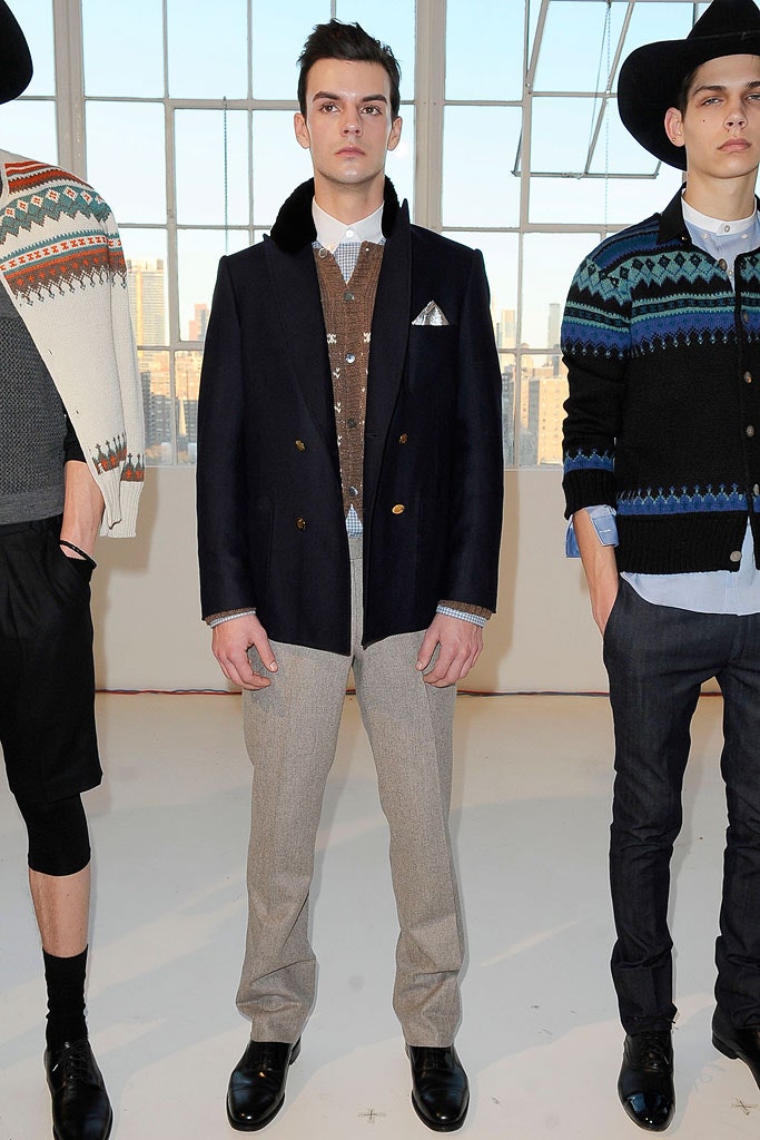 navy tailored blazer with gray sweater