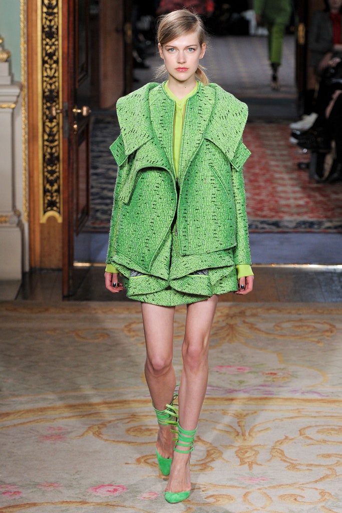 green tweed structured jacket and mini skirt