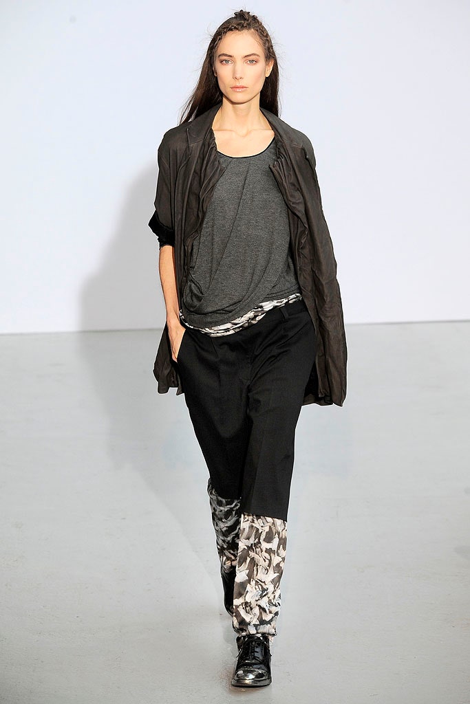 gray relaxed top with oversized black jacket