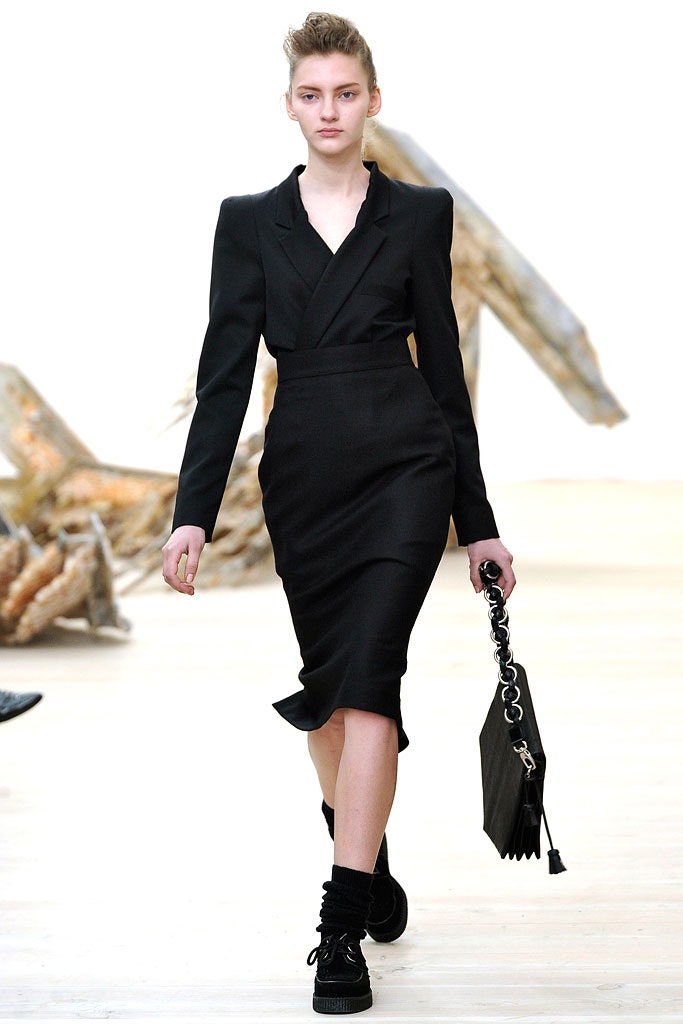 black fitted midi dress with bag