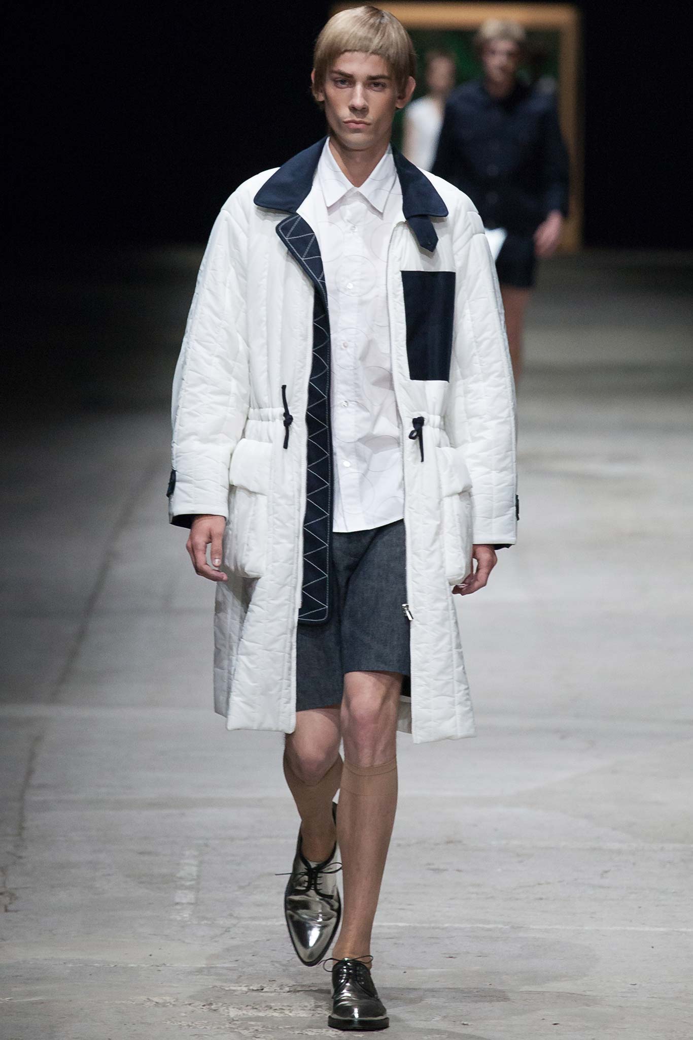 white coat with gray shorts