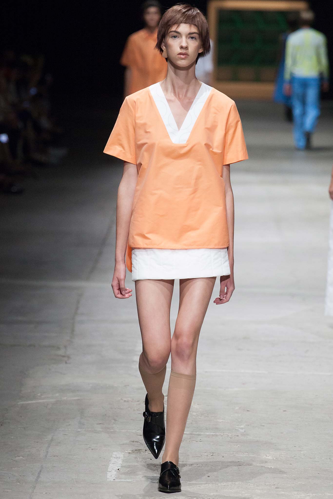 orange cotton top with white mini skirt